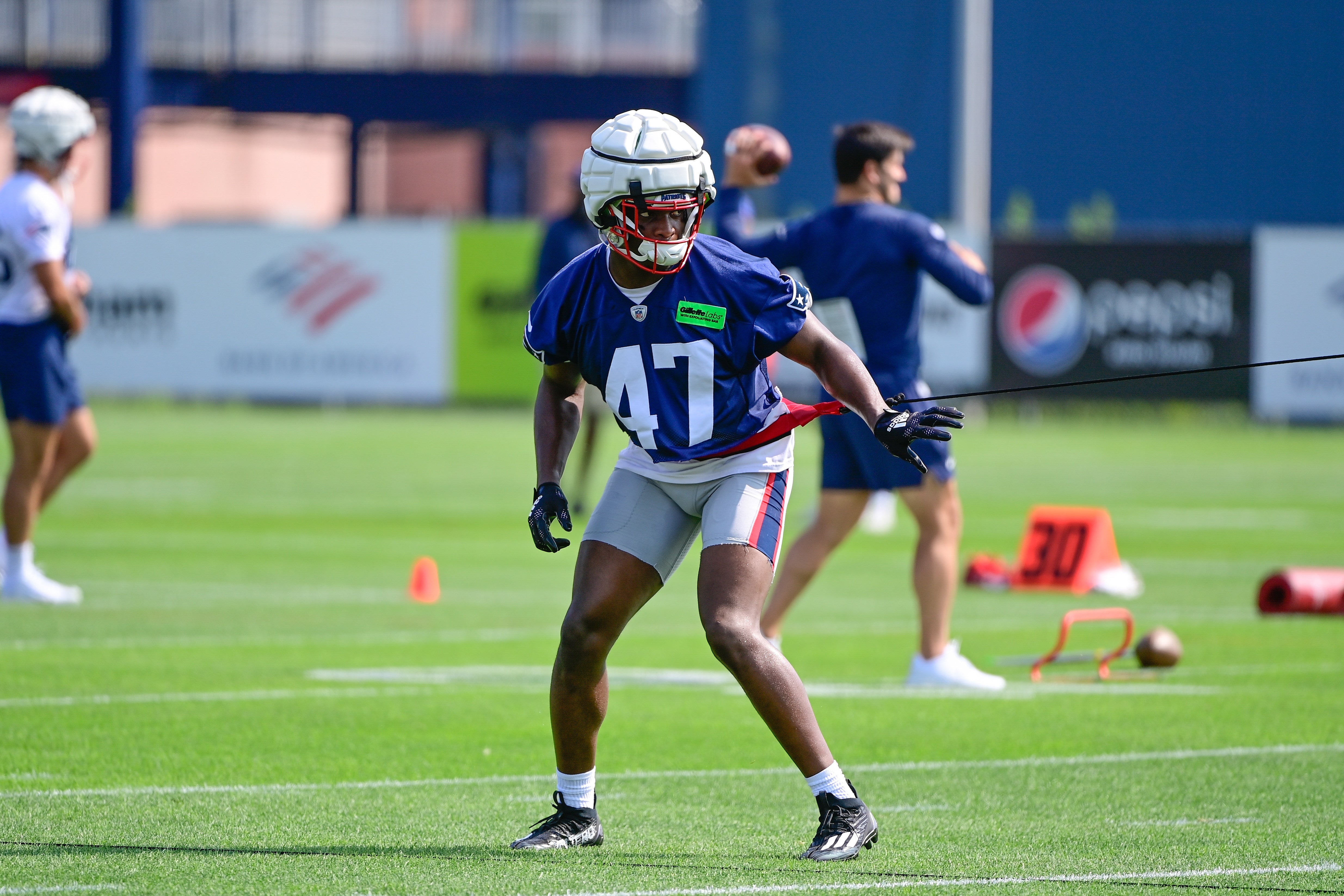 Jul 26, 2023; Foxborough, MA, USA; New England Patriots linebacker Olakunle Fatukasi (47) trains with a resistance rope during training camp at Gillette Stadium. Mandatory Credit: Eric Canha-USA TODAY Sports  