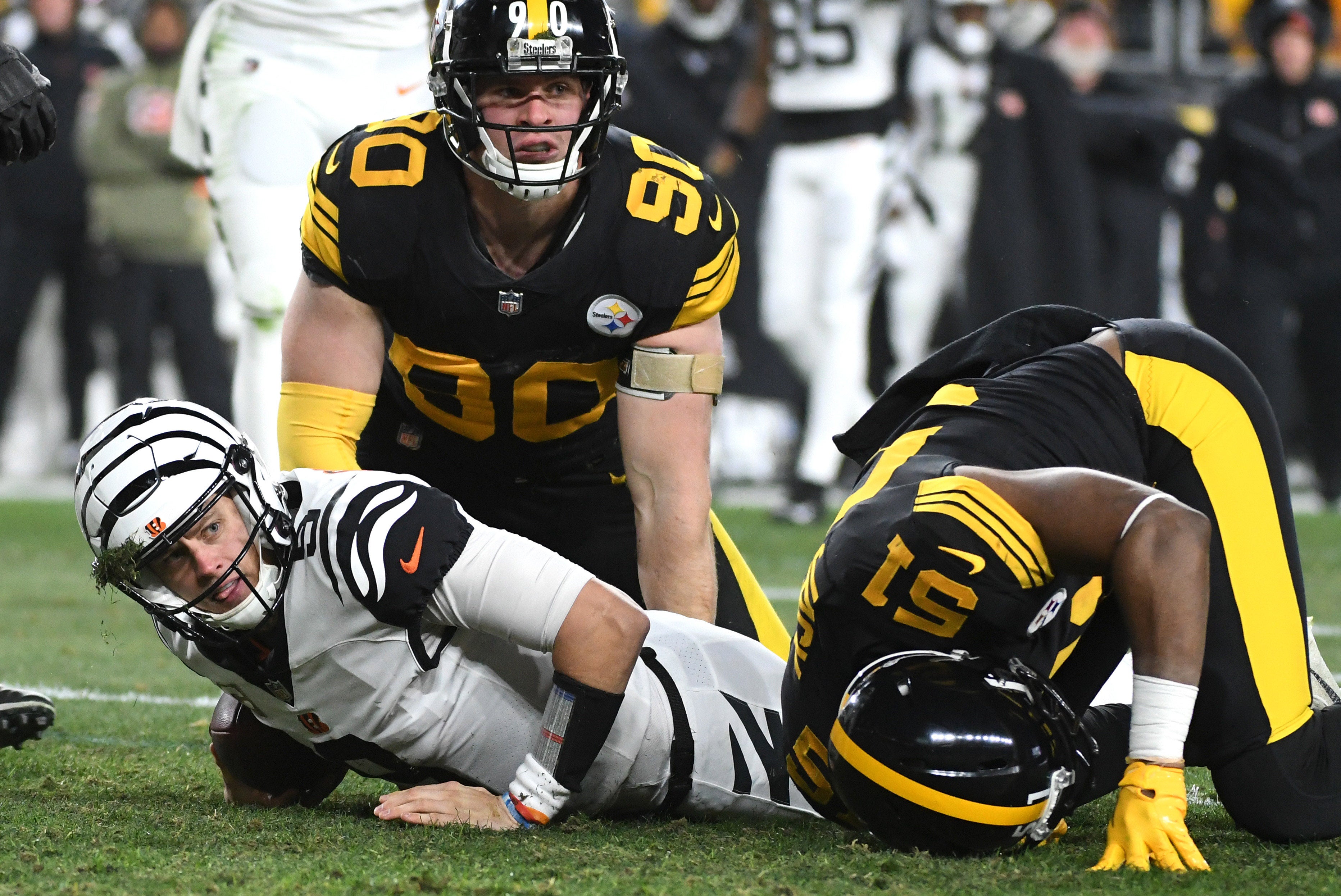 Nov 20, 2022; Pittsburgh, Pennsylvania, USA; Pittsburgh Steelers linebacker T.J. Watt (90) and Cincinnati Bengals quarterback Joe Burrow (9) during the second quarter at Acrisure Stadium. Mandatory Credit: Philip G. Pavely-USA TODAY Sports