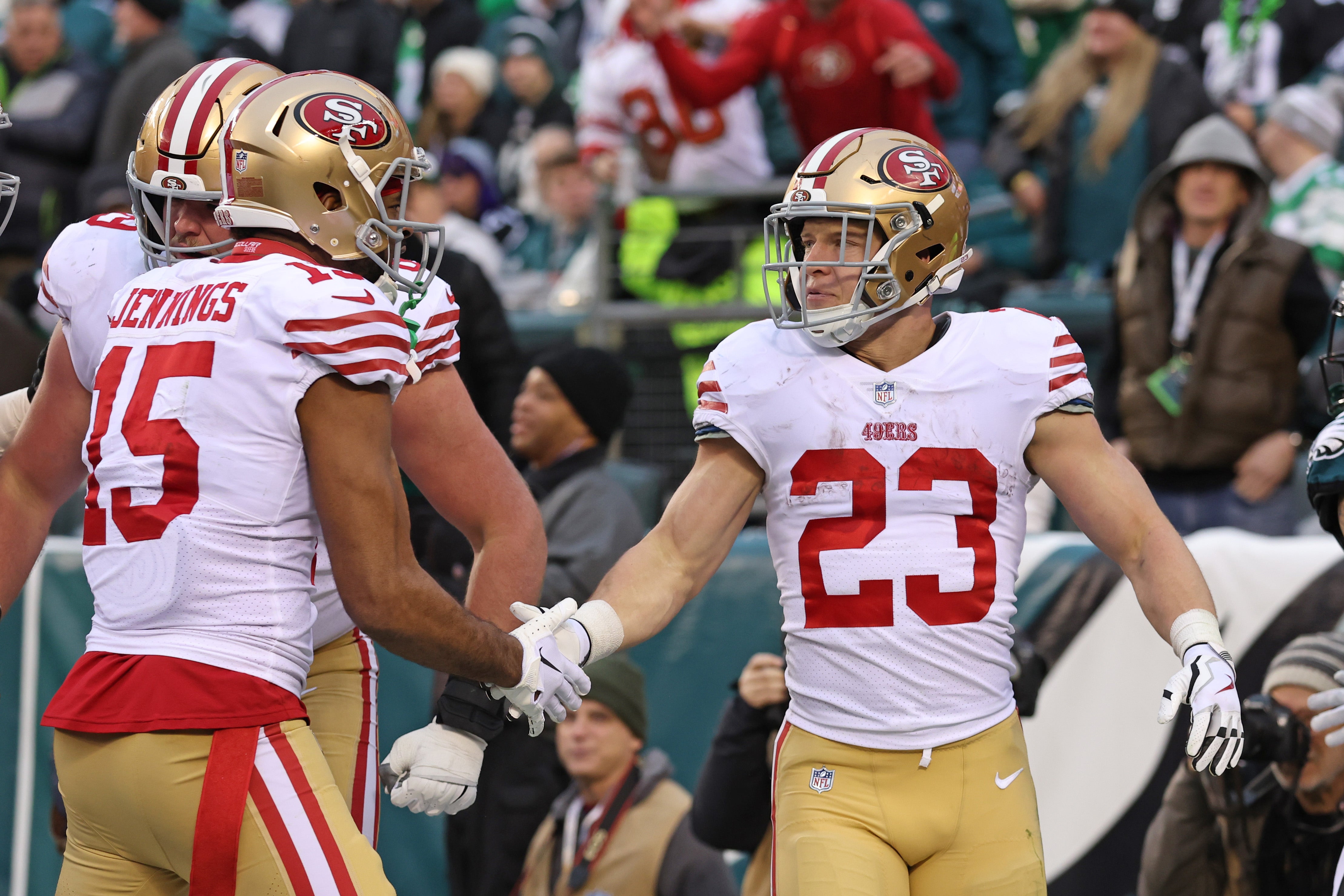 Jan 29, 2023; Philadelphia, Pennsylvania, USA; San Francisco 49ers running back Christian McCaffrey (23) celebrates his 23-yard touchdown run with wide receiver Jauan Jennings (15) against the Philadelphia Eagles during the second quarter in the NFC Championship game at Lincoln Financial Field. Mandatory Credit: Bill Streicher-USA TODAY Sports