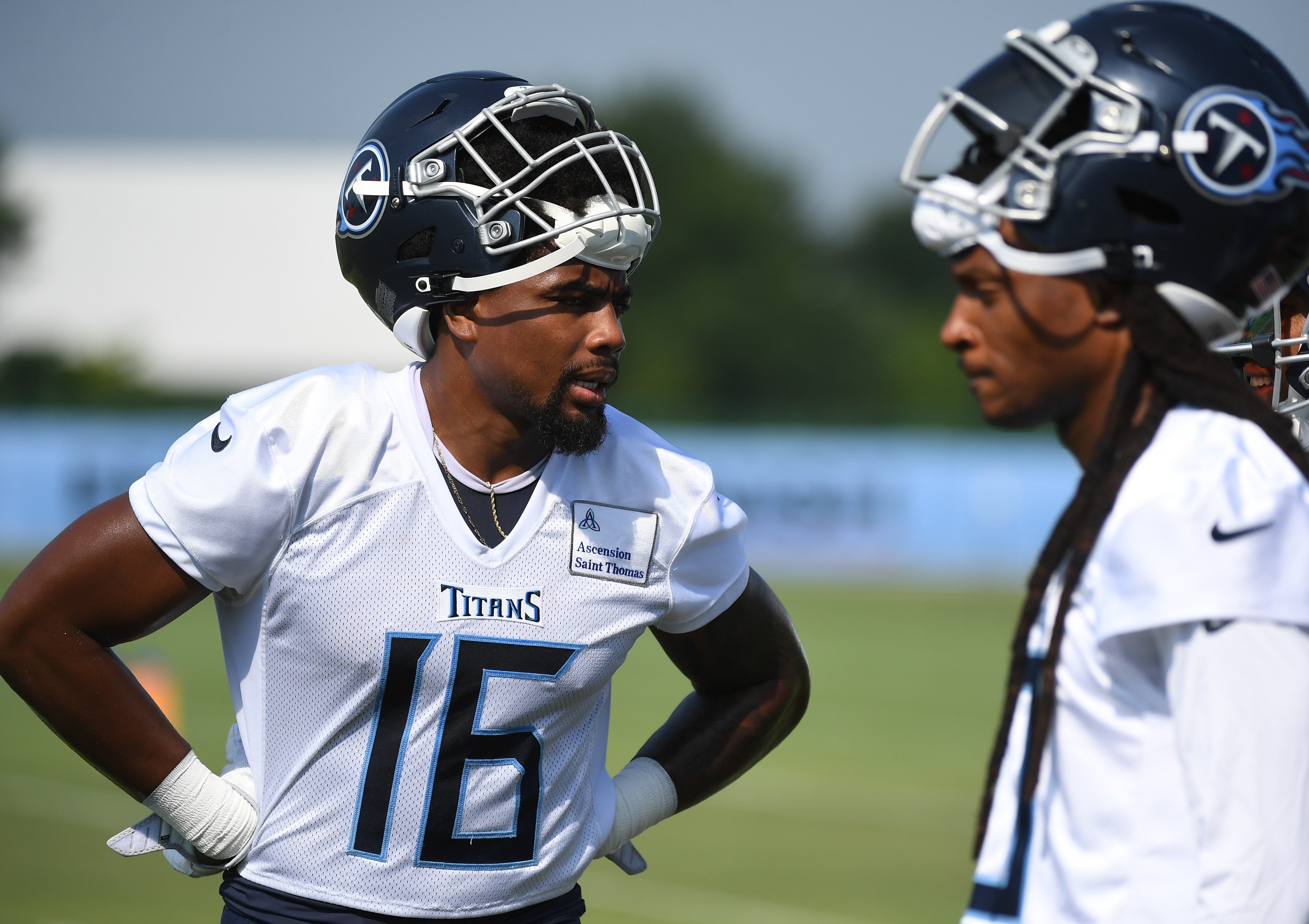 Jul 29, 2023; Nashville, TN, USA; Tennessee Titans wide receiver Treylon Burks (16) talks with wide receiver DeAndre Hopkins (10) during drills at training camp.