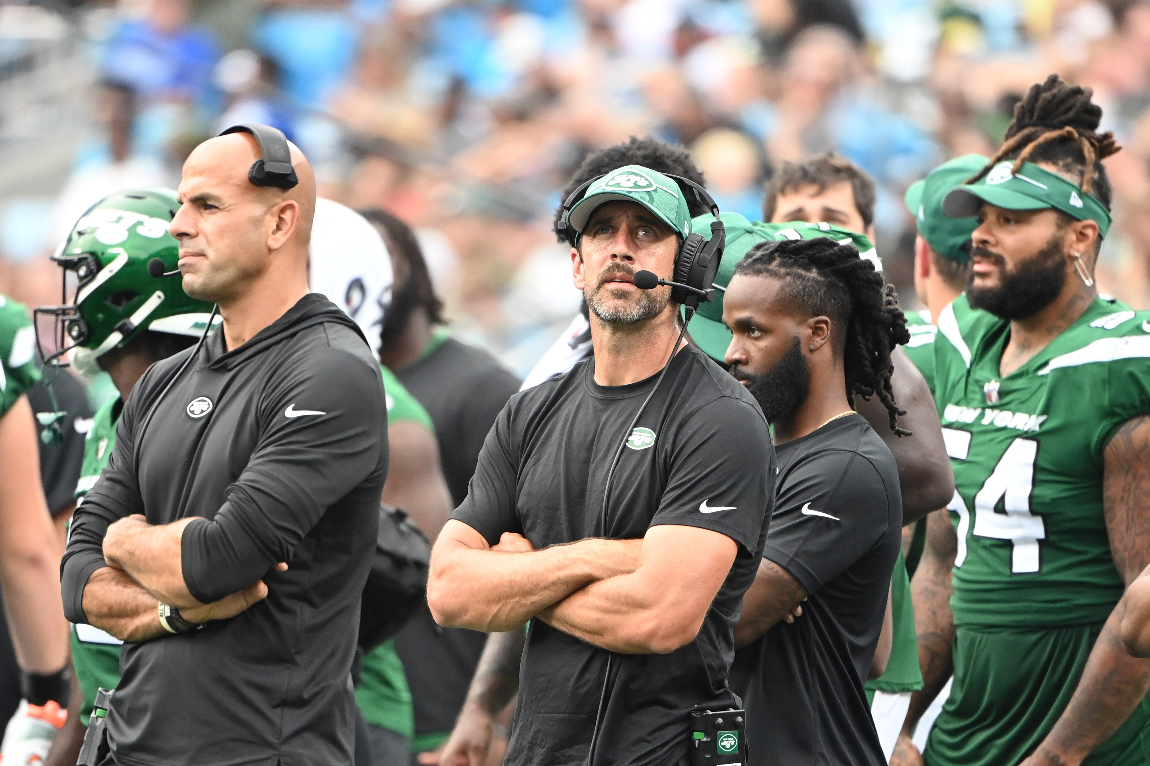 New York Jets quarterback Aaron Rodgers (8) behind Robert Saleh on the sidelines in the third quarter at Bank of America Stadium. Mandatory Credit: Bob Donnan-USA TODAY Sports