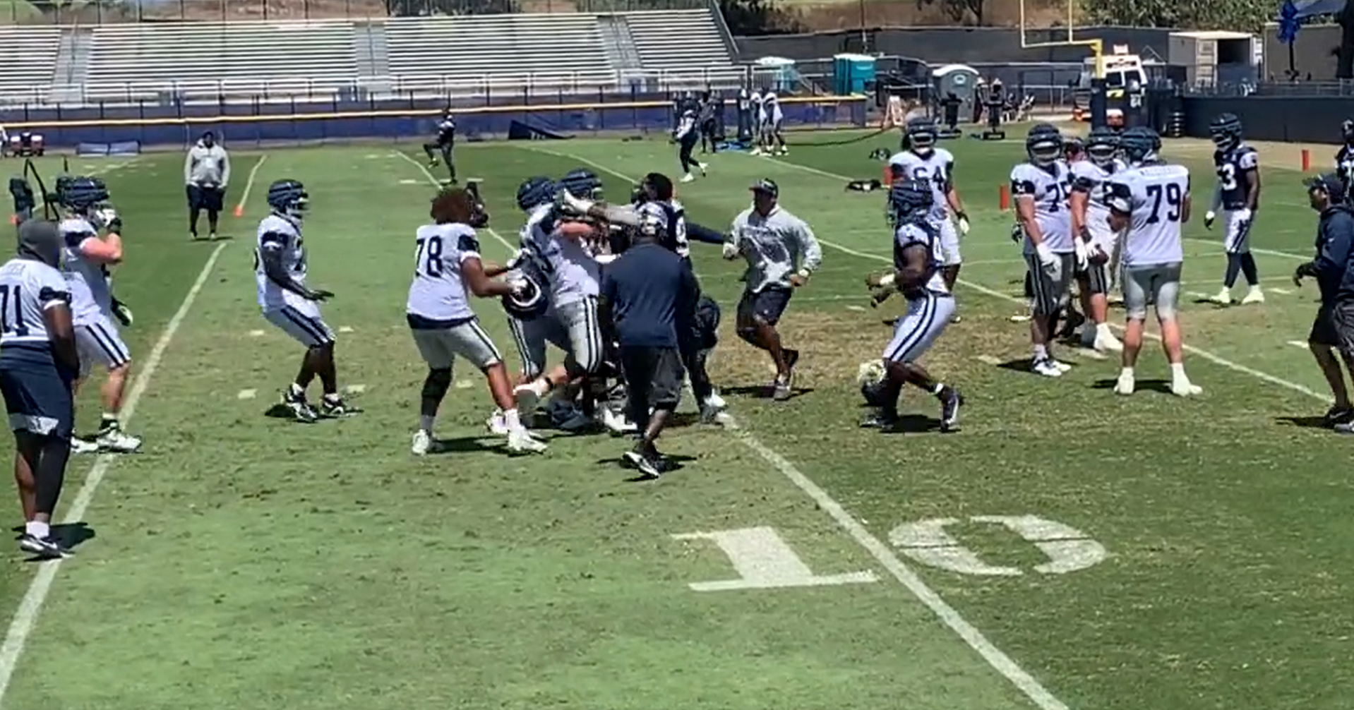 Dallas Cowboys Tyler Biadasz and DeMarcus Lawrence get into it in training camp. Via Patrik Walker's Twitter/X (@VoiceoftheStar)