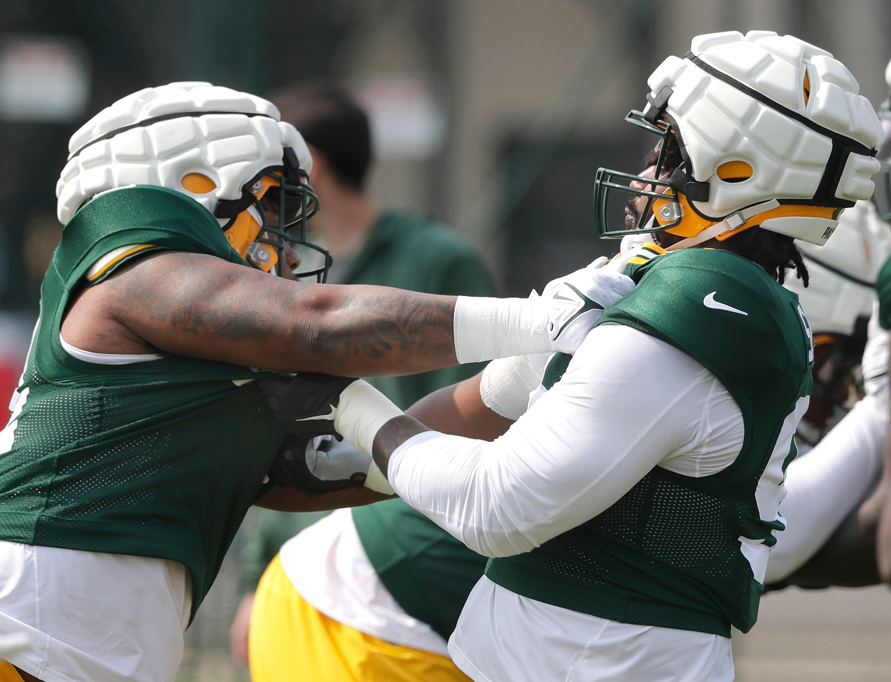 Green Bay Packers defensive end Karl Brooks (94) and defensive tackle Chris Slayton (98)during the Green Bay Packers 2023 training camp on Monday, July 31, 2023 at Ray Nitschke Field in Green Bay, Wis. Wm. Glasheen USA TODAY NETWORK-Wisconsin