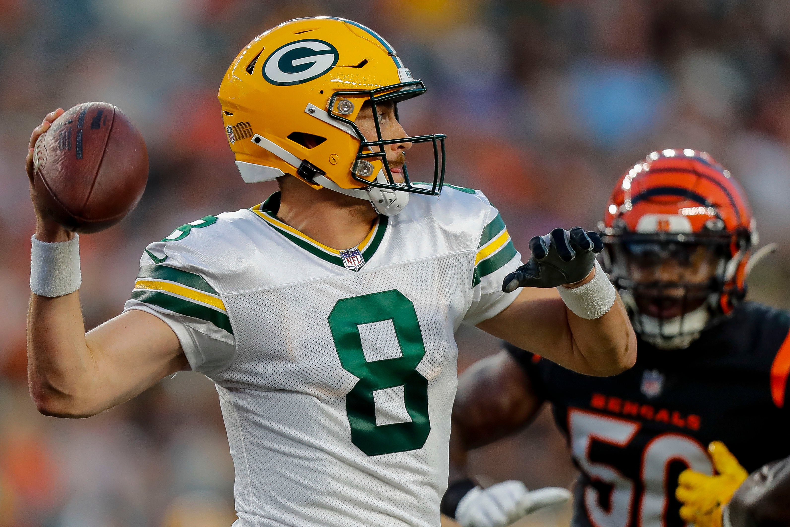 Aug 11, 2023; Cincinnati, Ohio, USA; Green Bay Packers quarterback Sean Clifford (8) throws a pass against the Cincinnati Bengals in the first half at Paycor Stadium. Katie Stratman-USA TODAY Sports