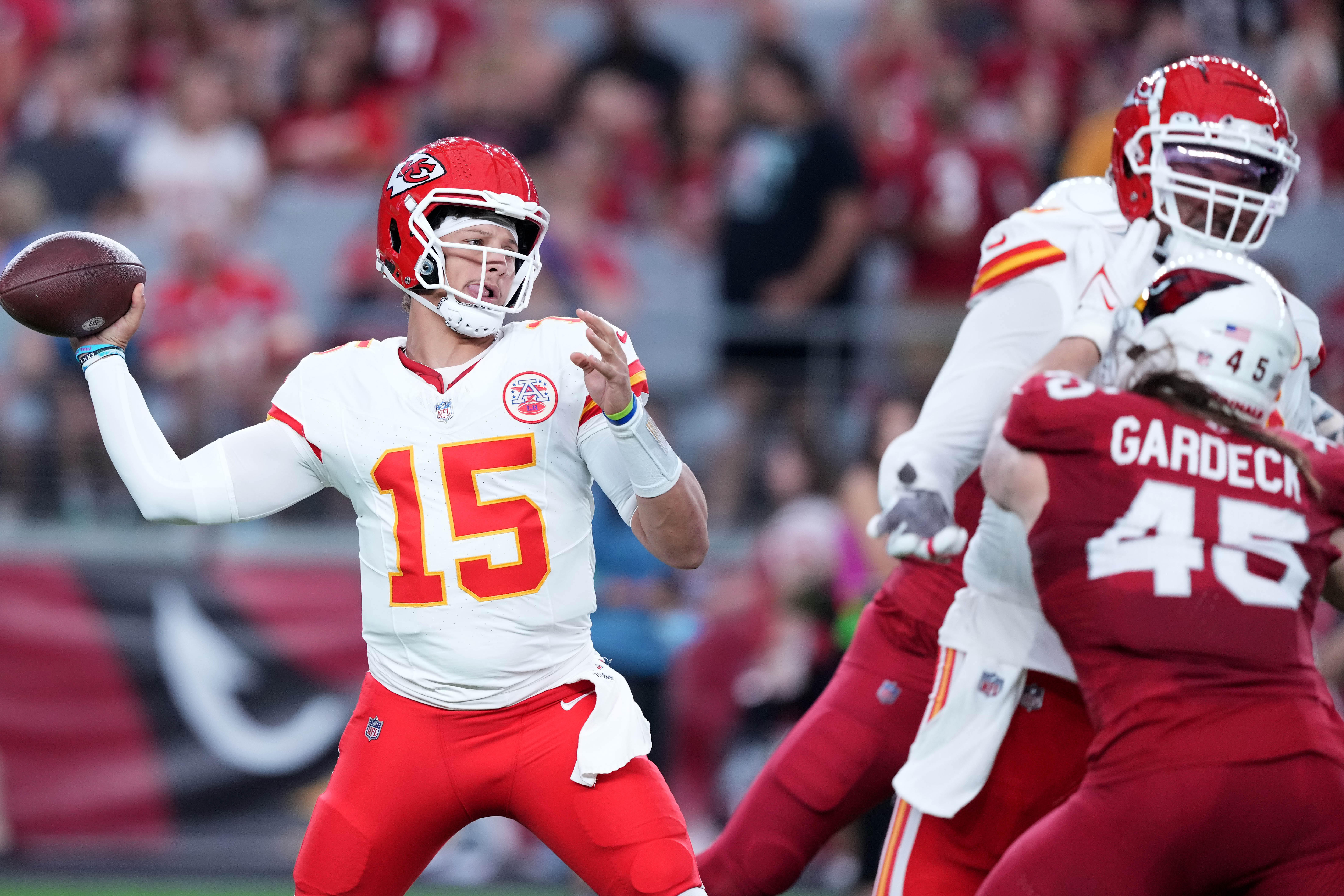 Aug 19, 2023; Glendale, Arizona, USA; Kansas City Chiefs quarterback Patrick Mahomes (15) throws a pass against the Arizona Cardinals during the first half at State Farm Stadium. Mandatory Credit: Joe Camporeale-USA TODAY Sports