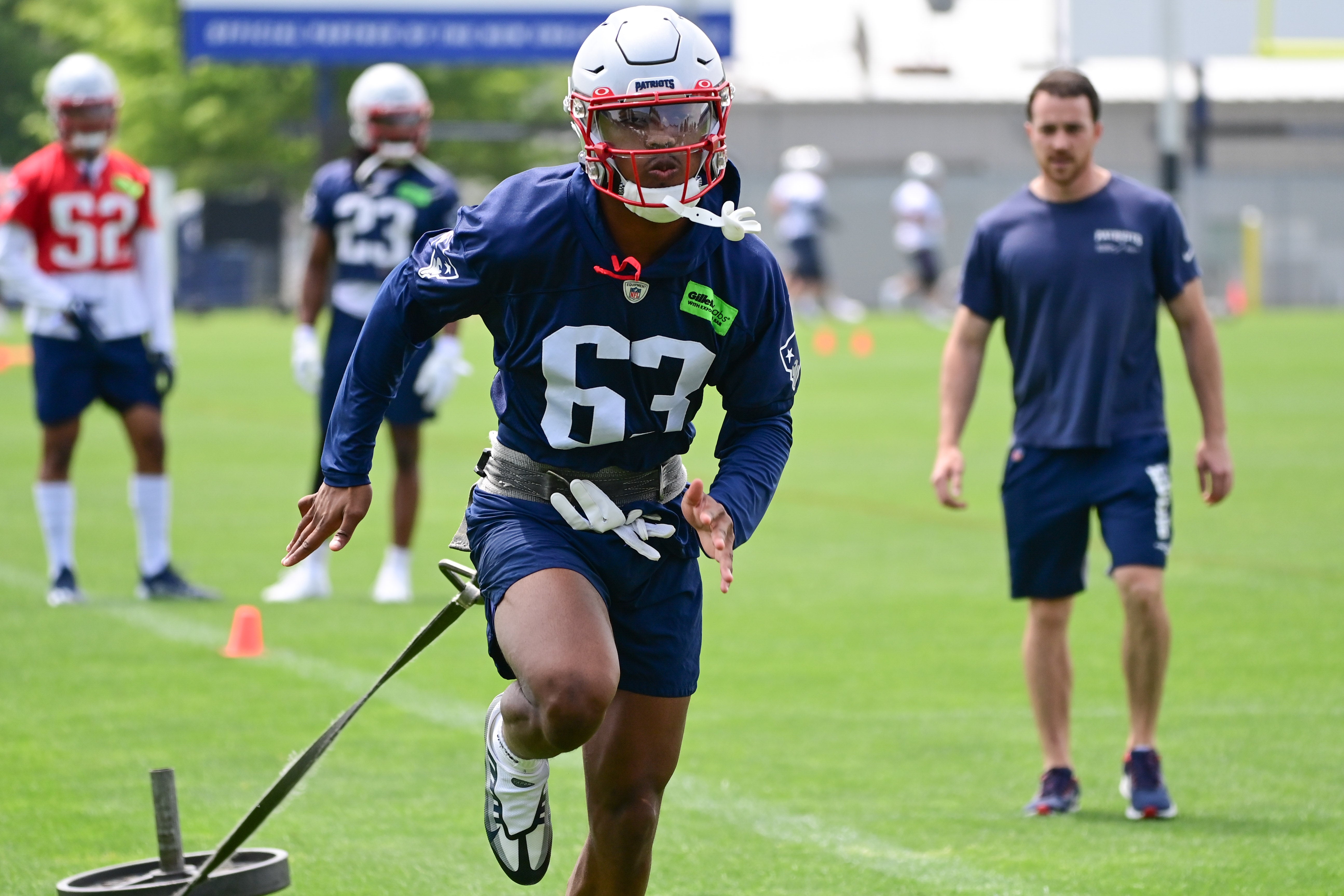 New England Patriots cornerback Isaiah Bolden (63) pulls a sled at the Patriots minicamp at Gillette Stadium. Mandatory Credit: Eric Canha-USA TODAY Sports
