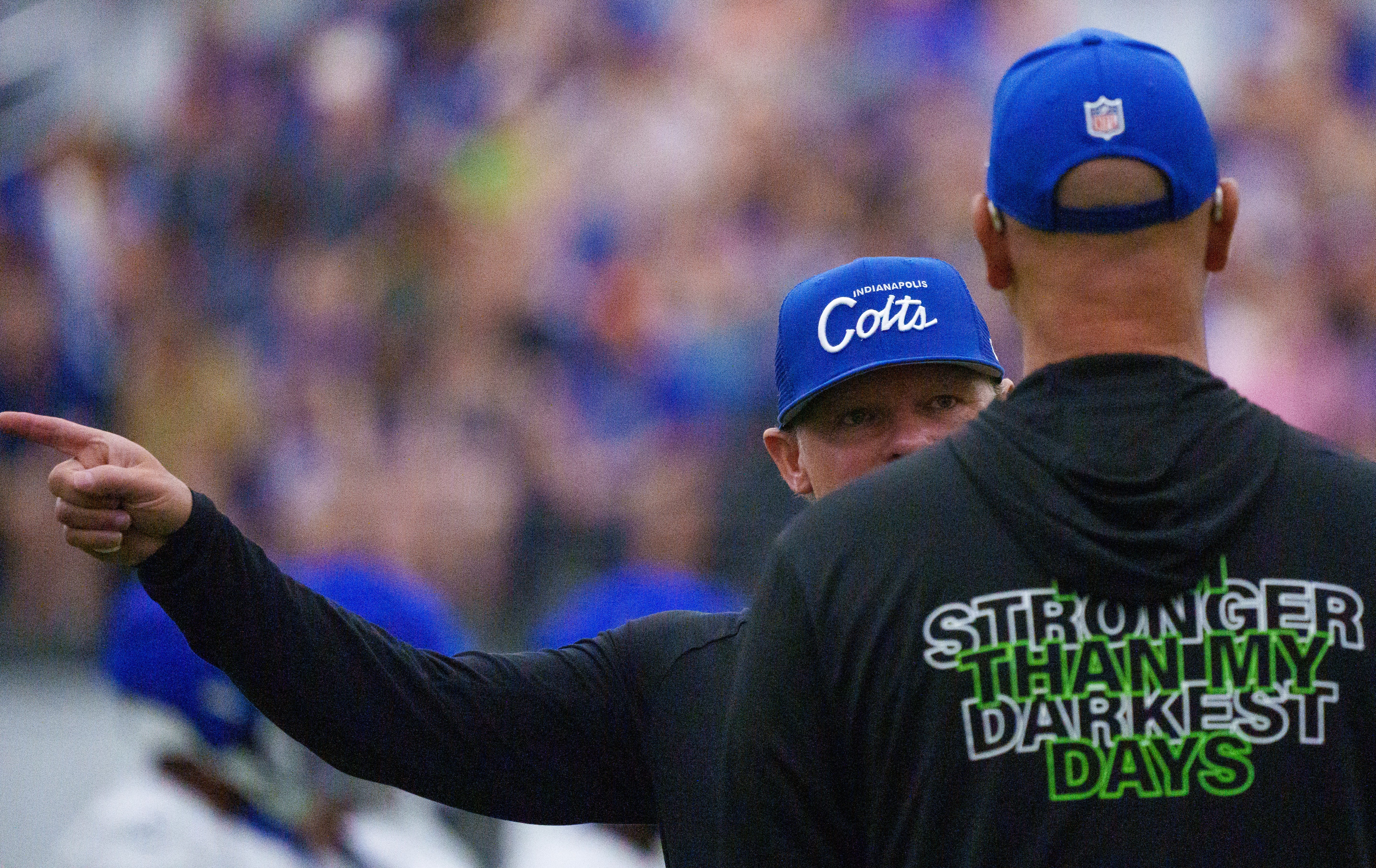 Indianapolis Colts general manager Chris Ballard speaks with defensive coordinator Gus Bradly on Friday, July 28, 2023, during an indoor practice at Grand Park Sports Campus in Westfield, Indiana.