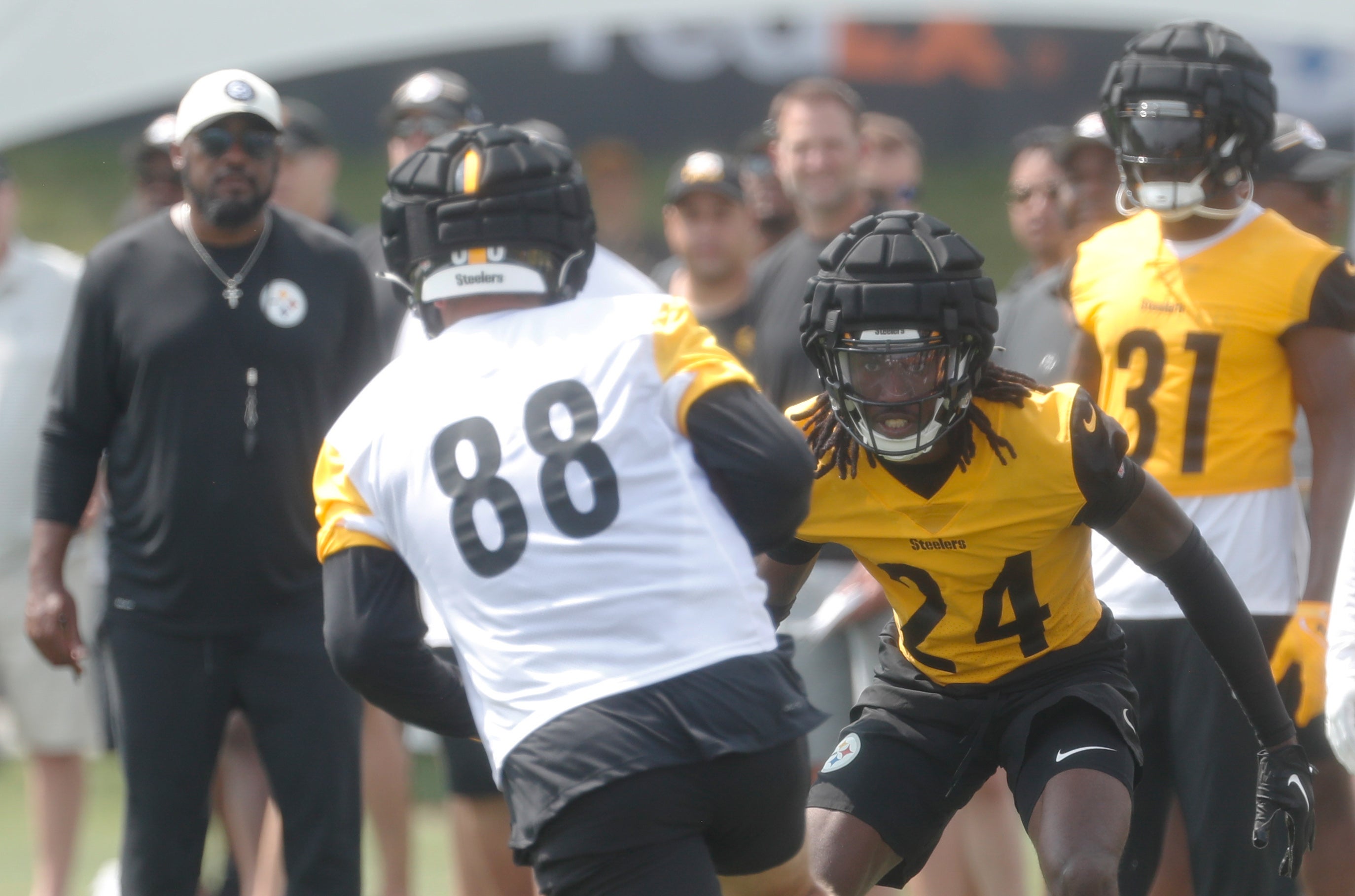 Jul 27, 2023; Latrobe, PA, USA; Pittsburgh Steelers cornerback Joey Porter Jr. (24) defends tight end Pat Freiermuth (88) in drills during training camp at Saint Vincent College. Mandatory Credit: Charles LeClaire-USA TODAY Sports