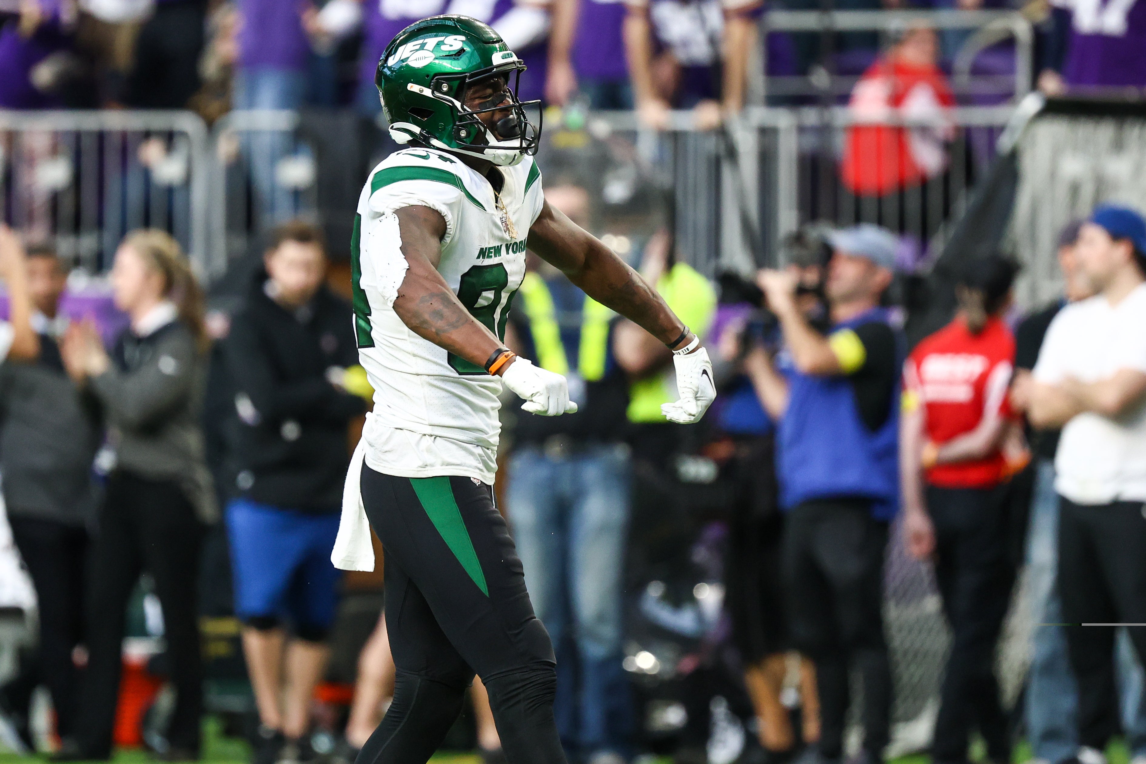 New York Jets wide receiver Corey Davis (84) reacts after making a catch against the Minnesota Vikings during the fourth quarter at U.S. Bank Stadium.