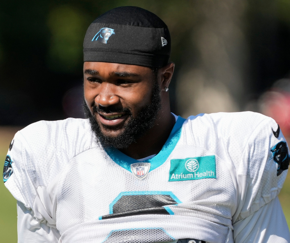 Jul 31, 2023; Spartanburg, SC, USA; Carolina Panthers running back Miles Sanders (6) walks to the practice field during training camp at Wofford College. Mandatory Credit: Jim Dedmon-USA TODAY Sports