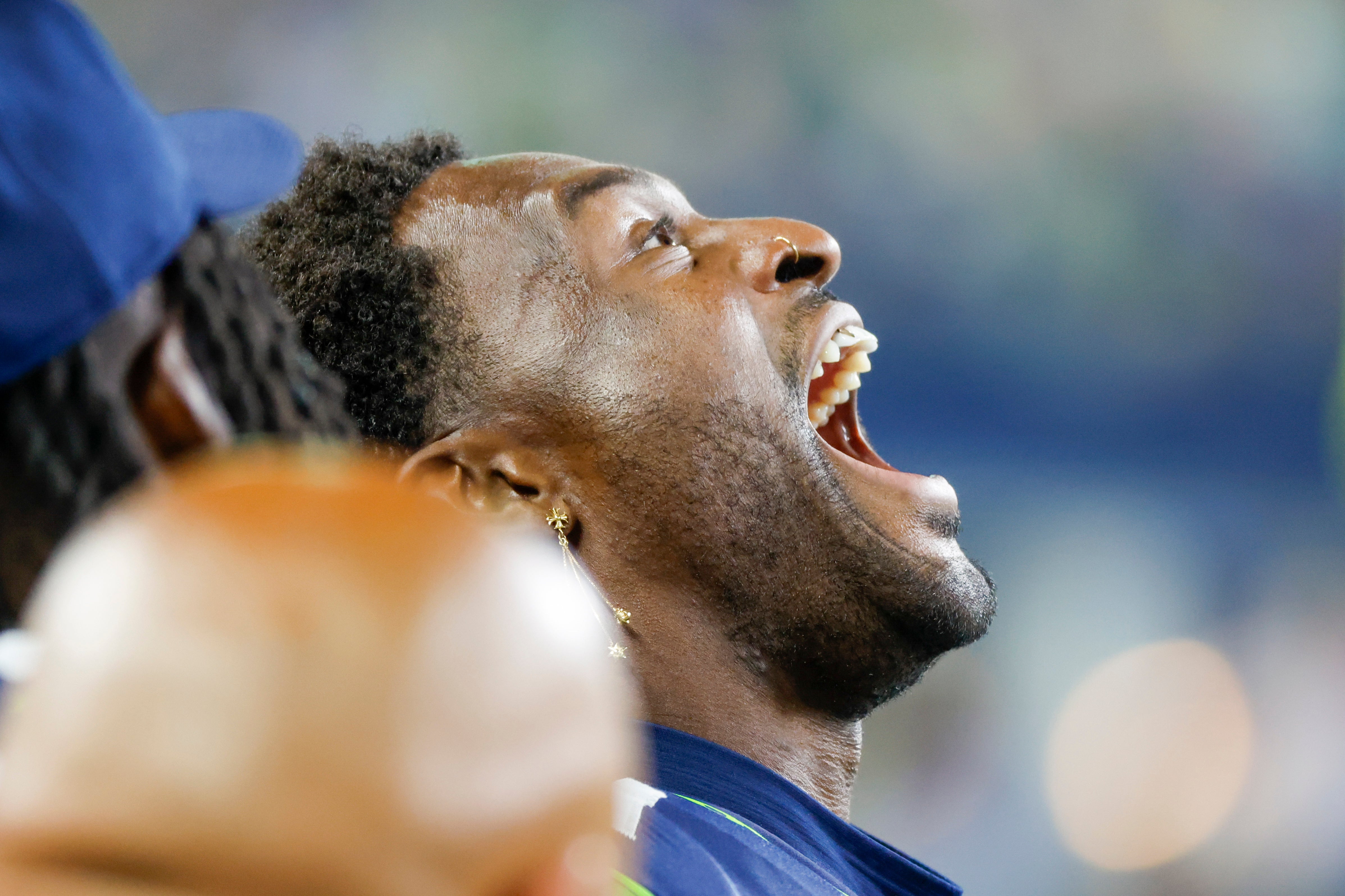 Aug 19, 2023; Seattle, Washington, USA; Seattle Seahawks wide receiver DK Metcalf (14) interacts with teammates on the sideline during the fourth quarter against the Dallas Cowboys at Lumen Field. Mandatory Credit: Joe Nicholson-USA TODAY Sports