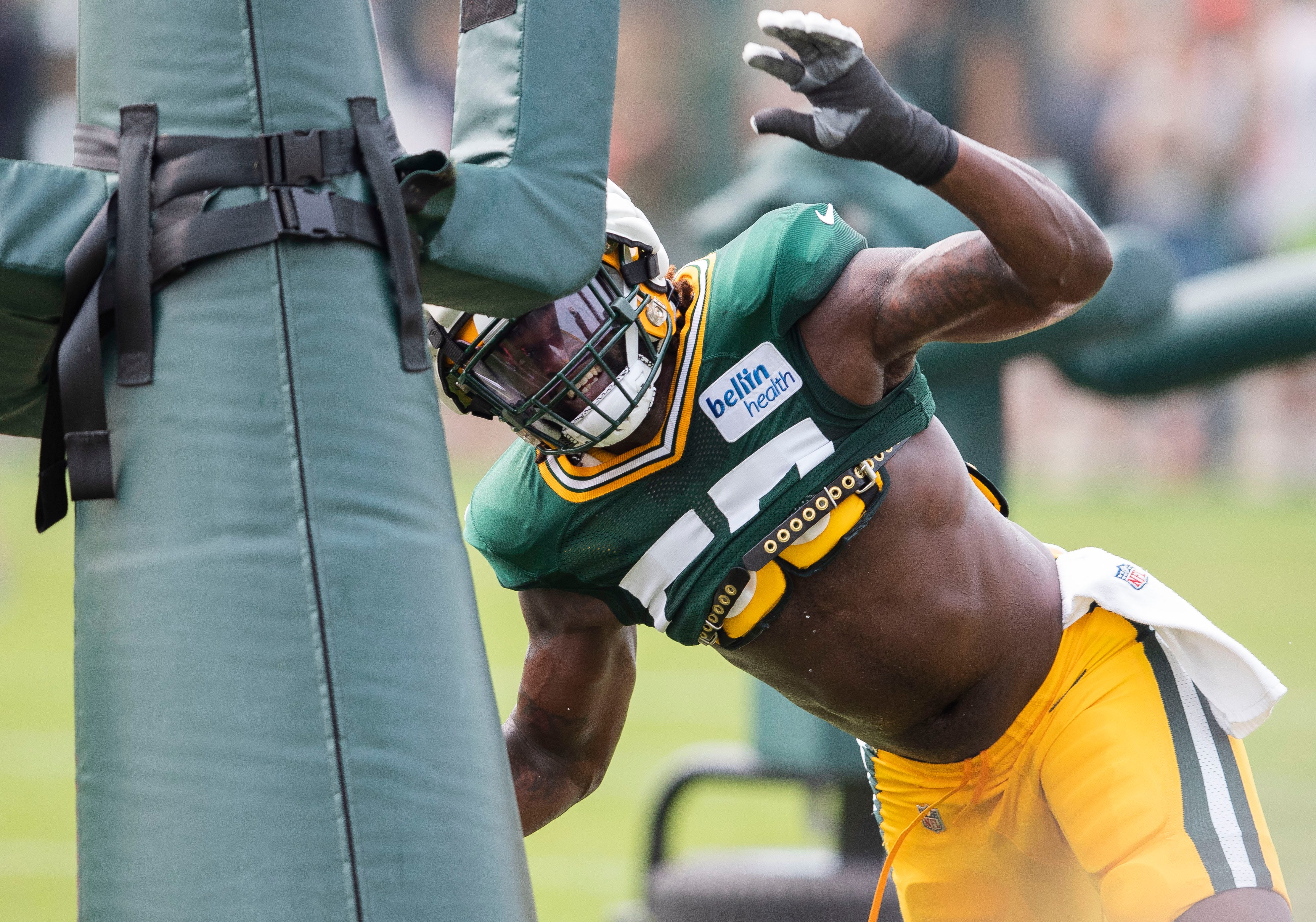 Green Bay Packers linebacker Brenton Cox Jr. (57) runs through a pass rush drill during practice on Tuesday, August 1, 2023, at Ray Nitschke Field in Green Bay, Wis. Tork Mason/USA TODAY NETWORK-Wisconsin