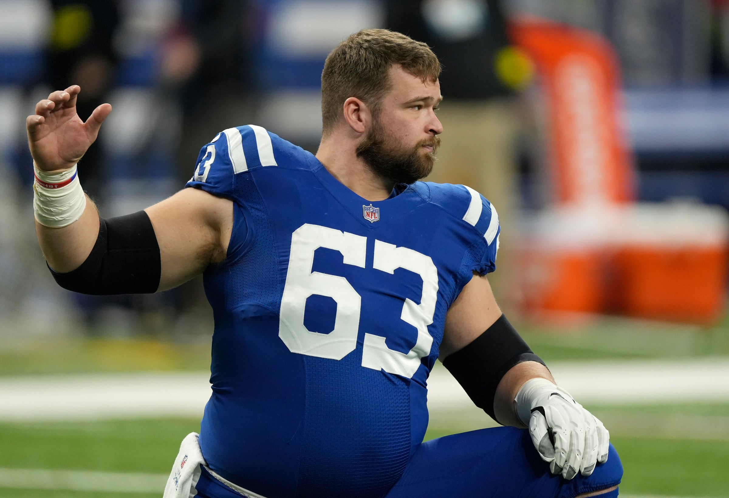Dec 26, 2022; Indianapolis, Indiana, USA; Indianapolis Colts guard Danny Pinter (63) warms up before action against the Los Angeles Chargers Monday, Dec. 26, 2022, at Lucas Oil Stadium.
