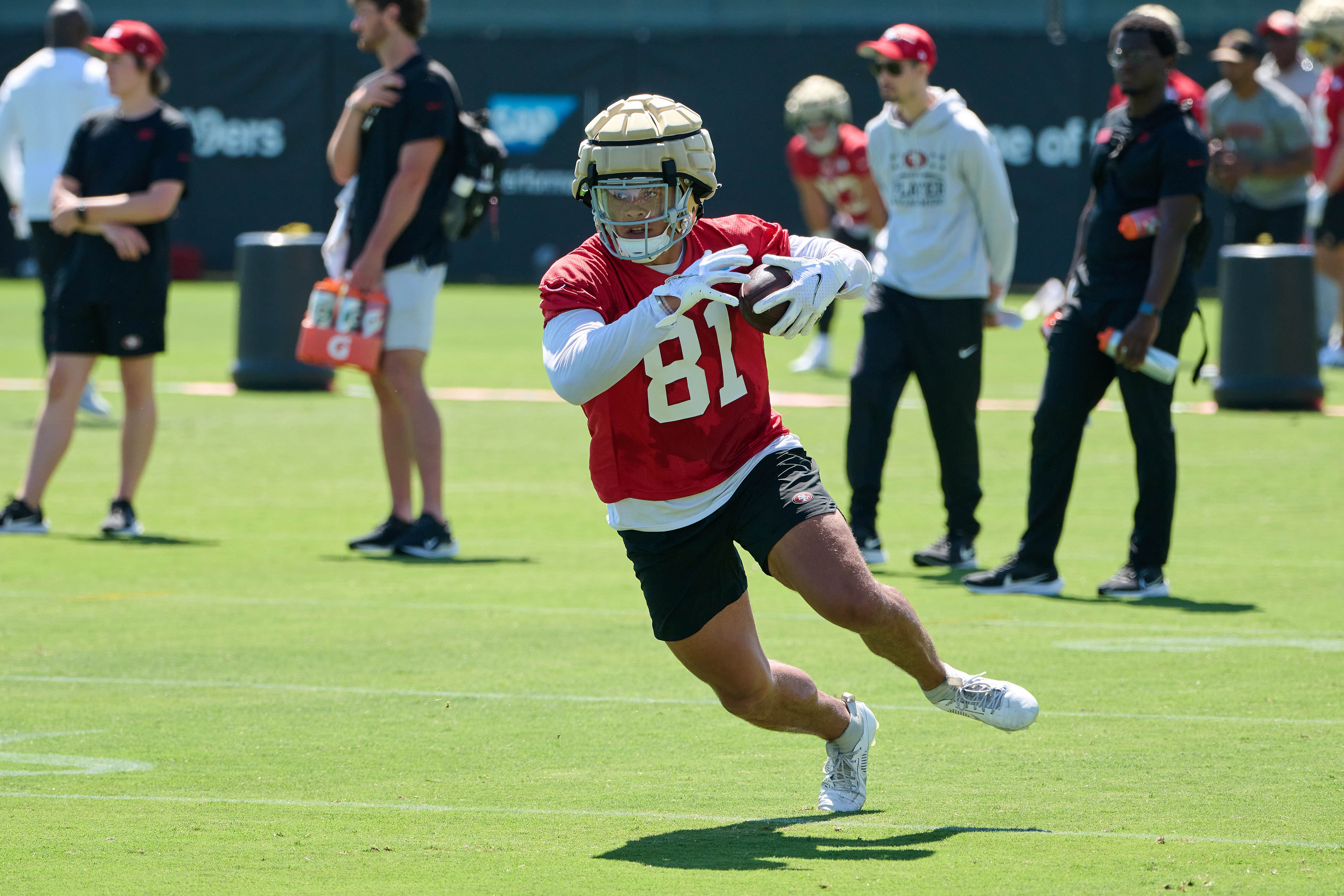 Jul 27, 2023; Santa Clara, CA, USA; San Francisco 49ers tight end Cameron Latu (81) runs with the football after making a catch during training camp at the SAP Performance Facility. Mandatory Credit: Robert Edwards-USA TODAY Sports