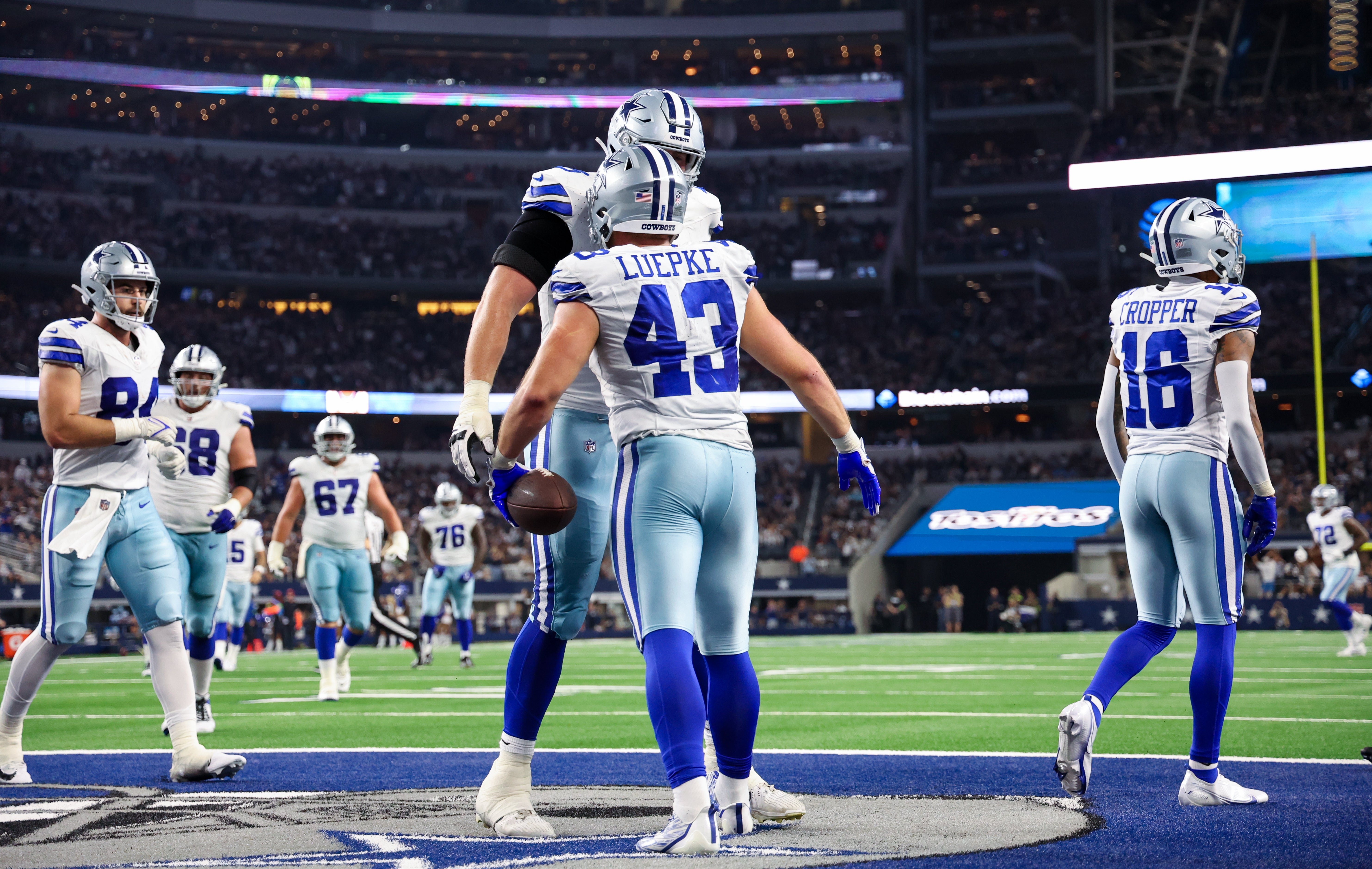 Dallas Cowboys running back Hunter Luepke (43) celebrates with Dallas Cowboys offensive tackle Matt Waletzko (79) after scoring a touchdown during the first half against the Las Vegas Raiders at AT&T Stadium. Mandatory Credit: Kevin Jairaj-USA TODAY Sports