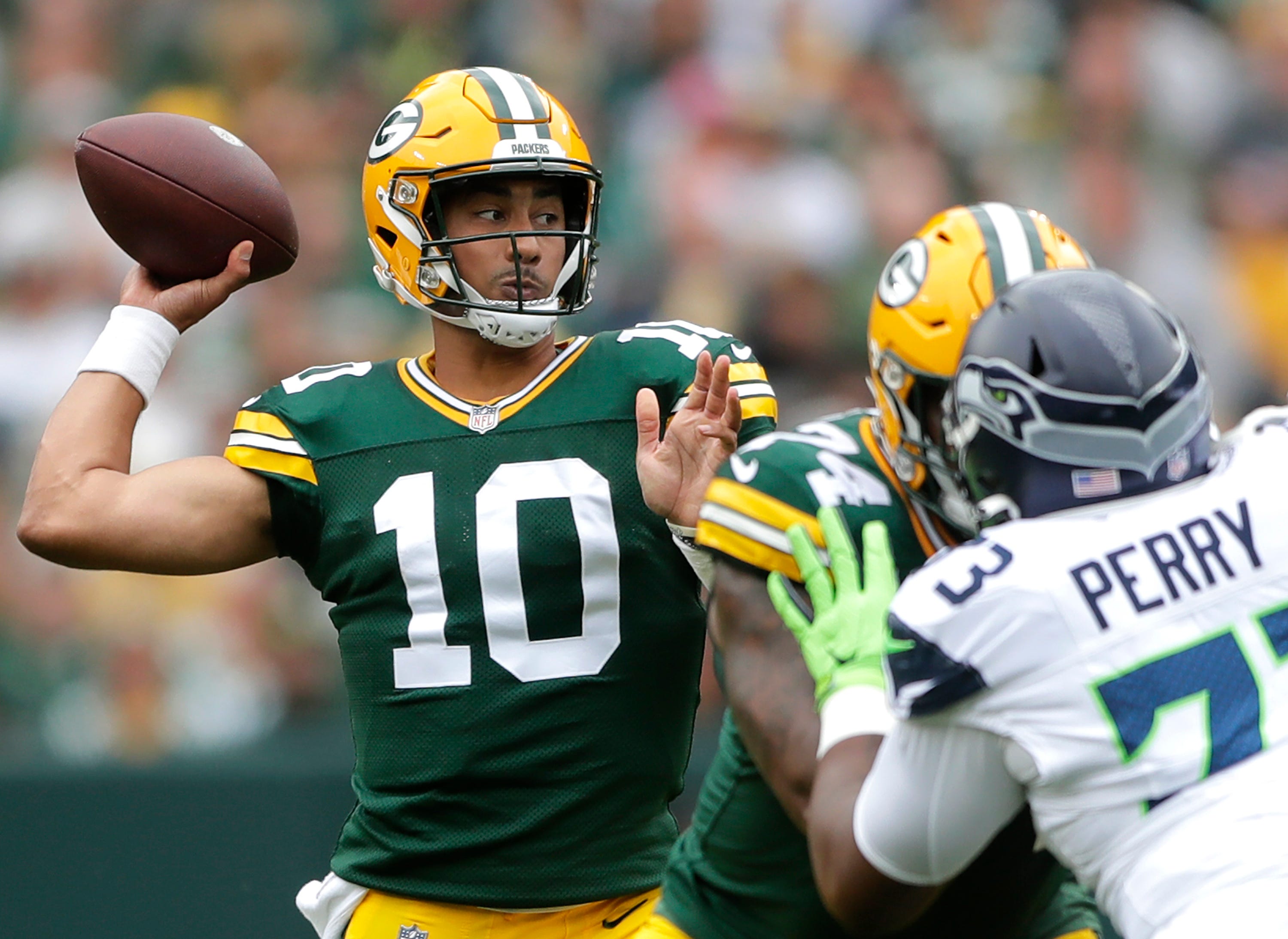 Green Bay Packers quarterback Jordan Love (10) scrammbles against the Seattle Seahawks during their preseason football game Saturday, August 26, 2023, at Lambeau Field in Green Bay, Wis. Green Bay defeated Seattle 19-15. Wm. Glasheen USA TODAY NETWORK-Wisconsin