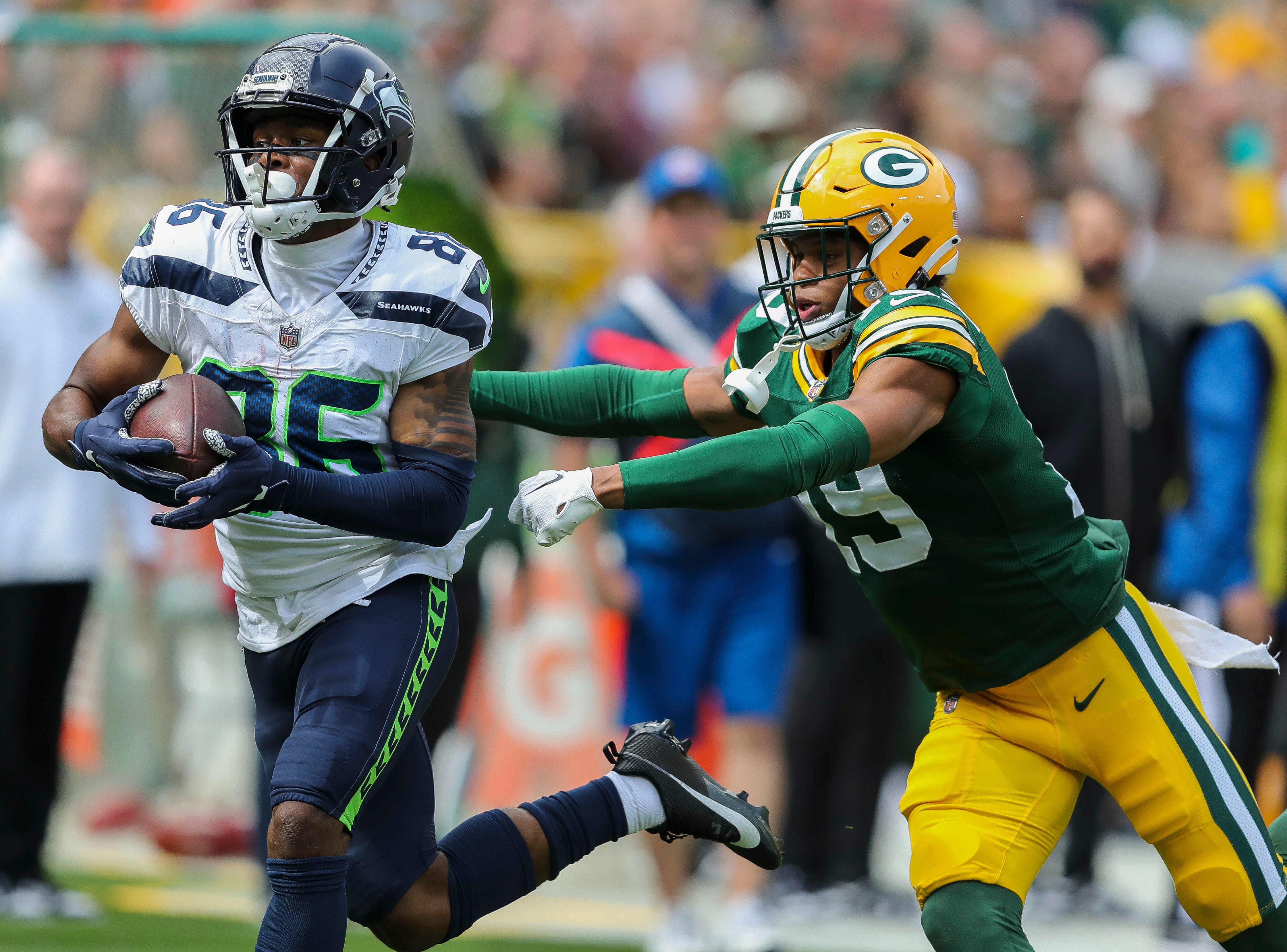 Seattle Seahawks wide receiver Easop Winston Jr. beats Green Bay Packers cornerback Elijah Hamilton (19) for a reception during their preseason football game on Saturday, August 26, 2023, at Lambeau Field in Green Bay, Wis. The Packers won the game, 19-15. Tork Mason/USA TODAY NETWORK-Wisconsin