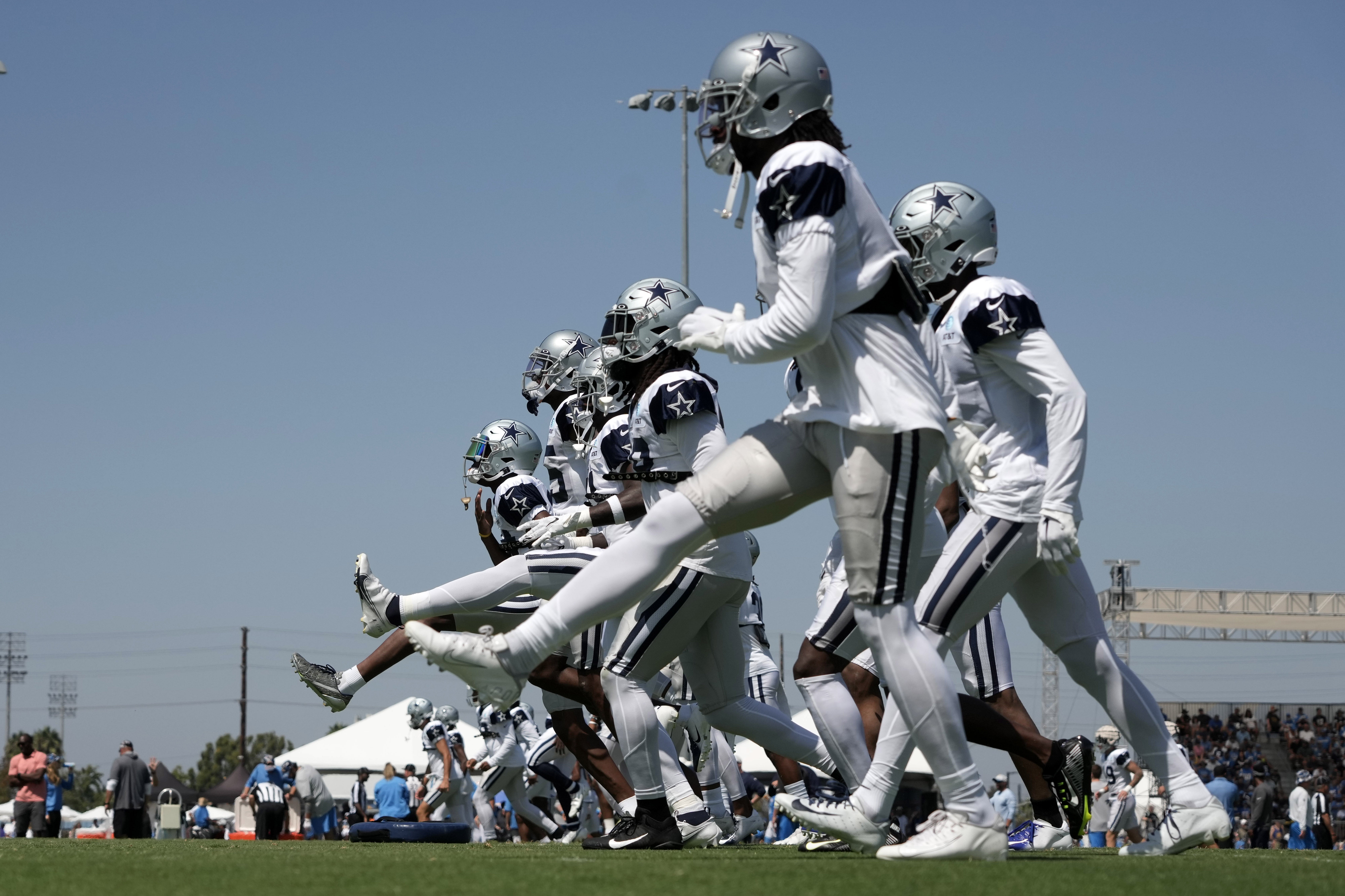 Dallas Cowboys players stretch during joint practice against the Los Angeles Chargers at Jack Hammett Sports Complex. Mandatory Credit: Kirby Lee-USA TODAY Sports