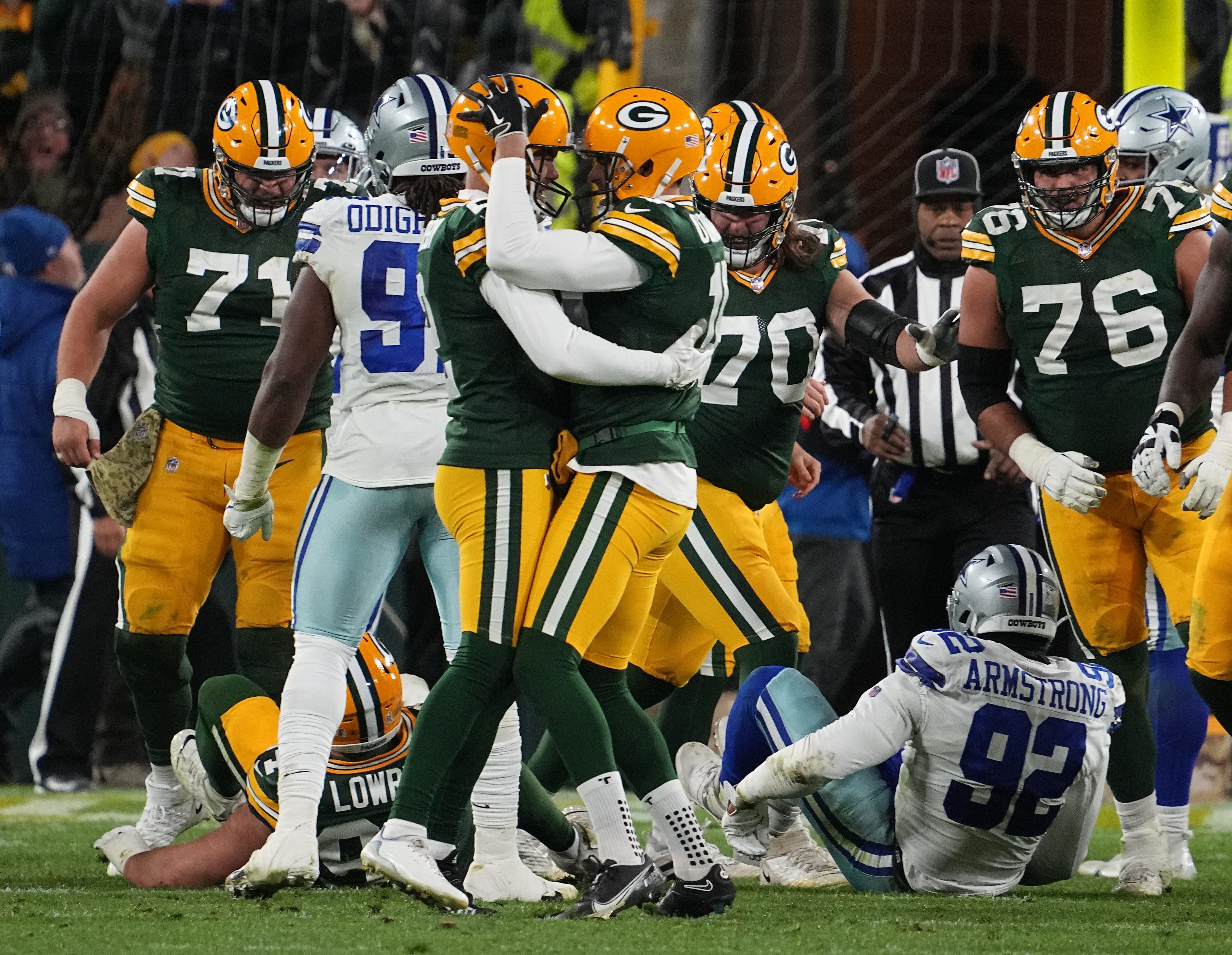 Green Bay Packers place kicker Mason Crosby is embraced by punter Pat O'Donnell (16) after kicking the game-winning field goal during overtime during in their game Sunday, November 13, 2022 at Lambeau Field in Green Bay, Wis. The Green Bay Packers beat the Dallas Cowboys 31-28 in overtime. MARK HOFFMAN/MILWAUKEE JOURNAL SENTINEL / USA TODAY NETWORK