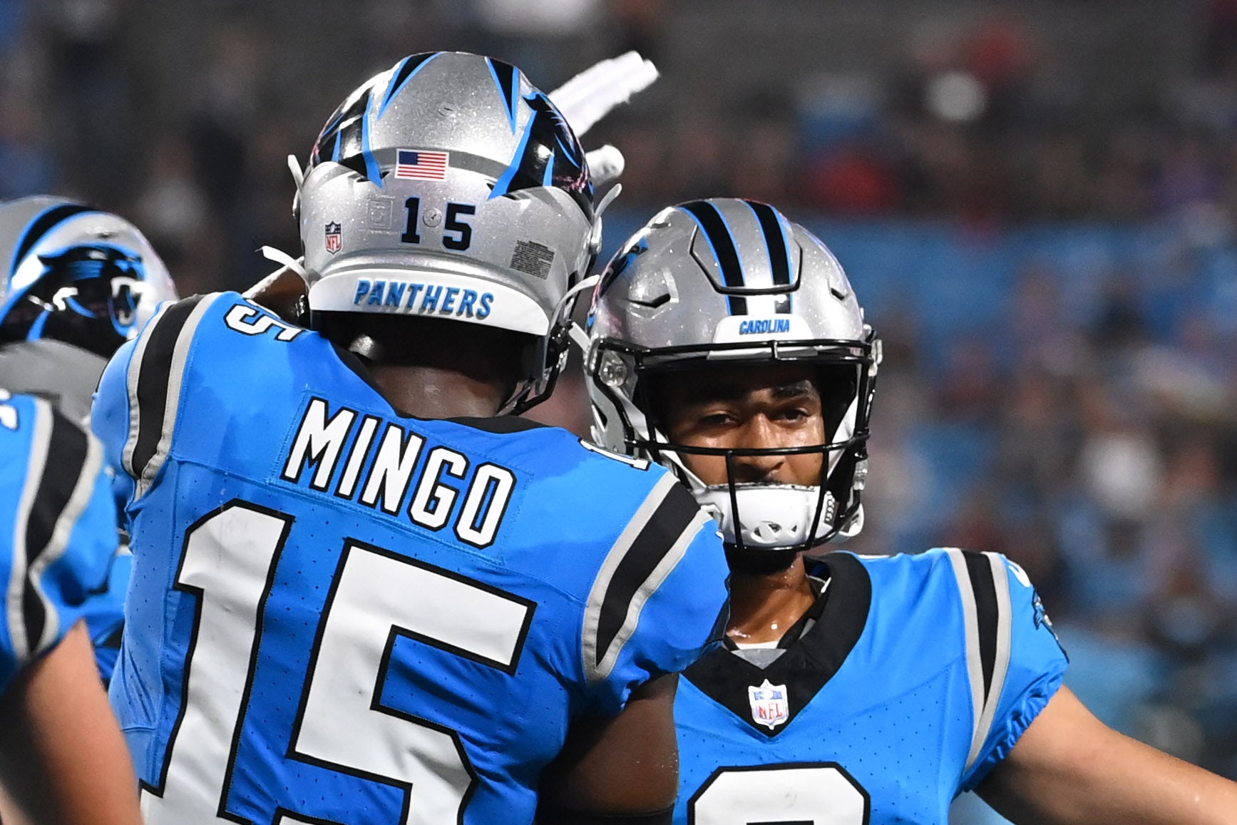 Aug 25, 2023; Charlotte, North Carolina, USA; Carolina Panthers wide receiver Jonathan Mingo (15) with quarterback Bryce Young (9) in the first quarter at Bank of America Stadium. Mandatory Credit: Bob Donnan-USA TODAY Sports