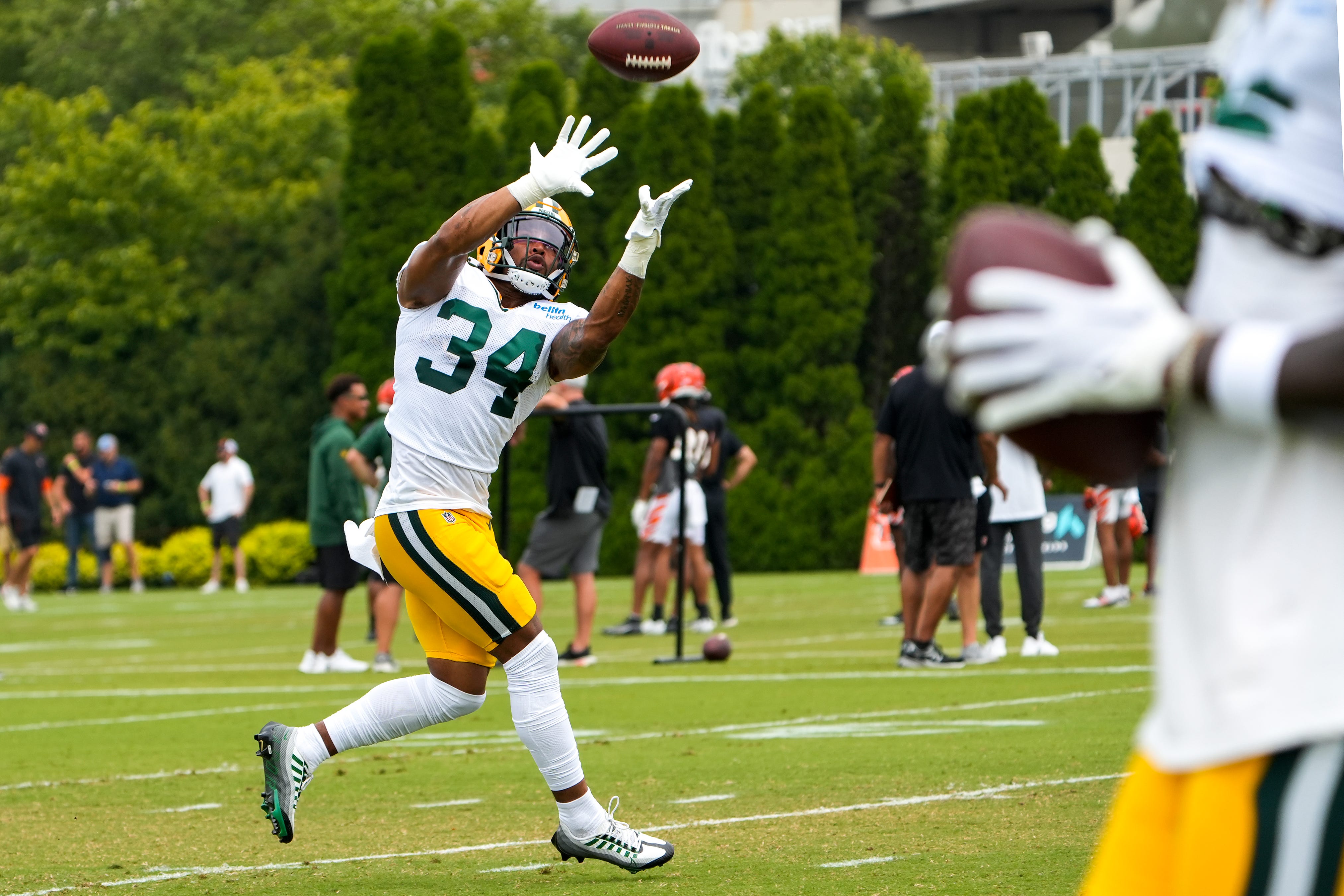 Green Bay Packers safety Jonathan Owens (34) catches a pass during a joint practice between the Green Bay Packers and the Cincinnati Bengals, Wednesday, Aug. 9, 2023, at the practice fields next to Paycor Stadium in Cincinnati. Carter Skaggs/The Enquirer / USA TODAY NETWORK