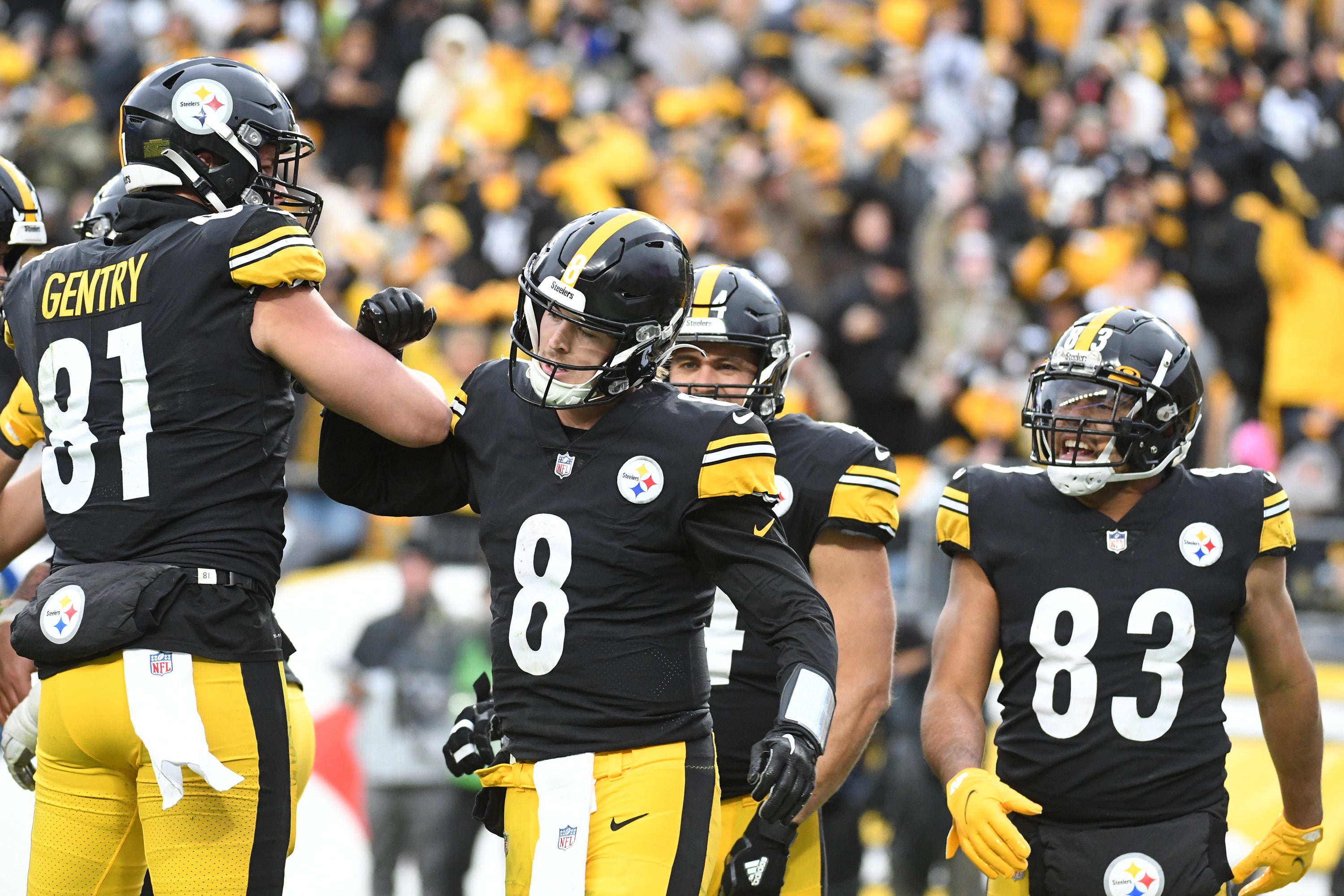Nov 13, 2022; Pittsburgh, Pennsylvania, USA; Pittsburgh Steelers quarterback Kenny Pickett (8) celebrates a touchdown with tight end Zach Gentry (81) against the New Orleans Saints during the fourth quarter at Acrisure Stadium. The Steelers won 20-10. Mandatory Credit: Philip G. Pavely-USA TODAY Sports  