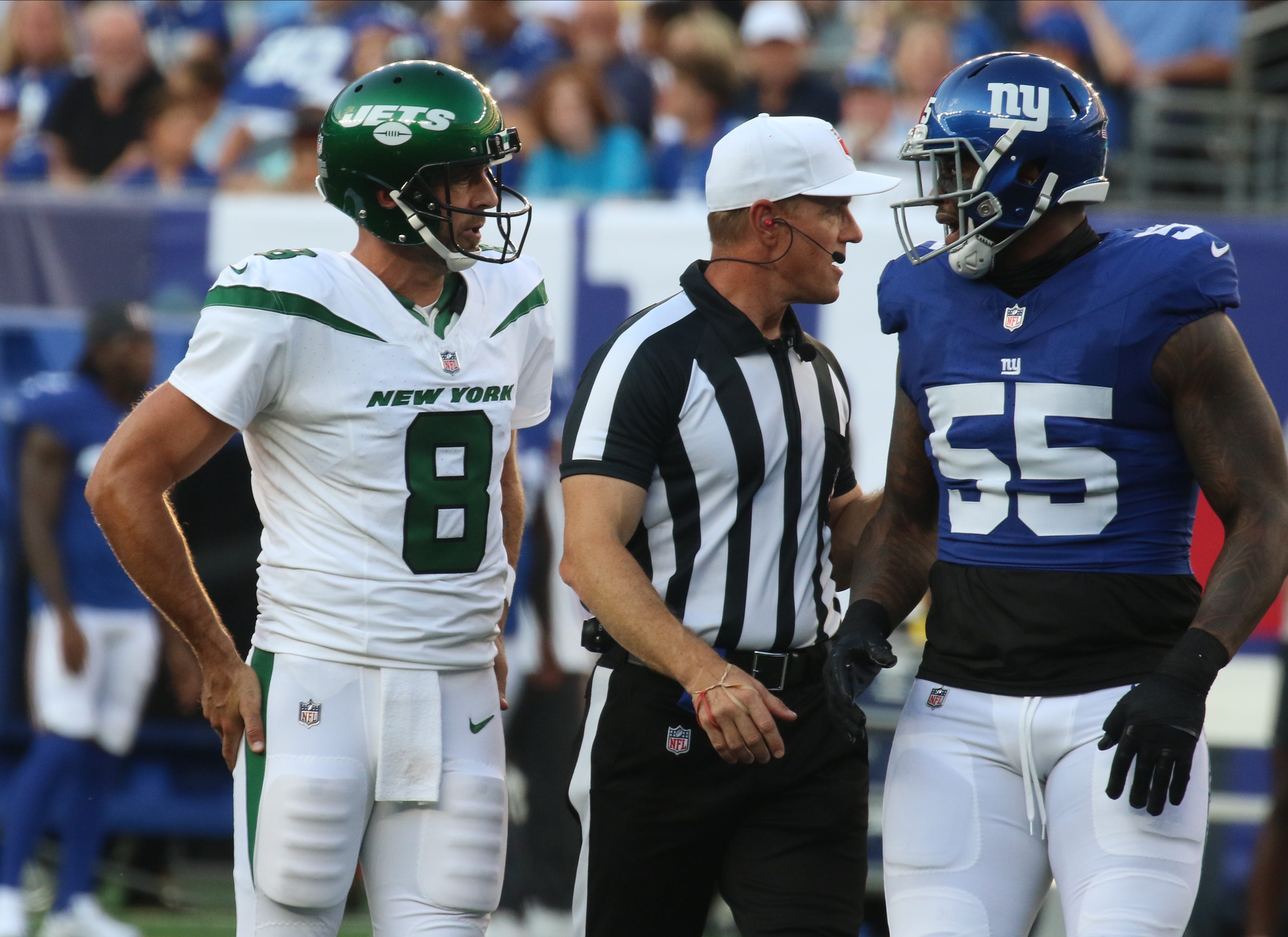 Jets quarterback Aaron Rodgers argues with Jihad Ward of the Giants in the first half. The NY Jets against the NY Giants on August 26, 2023 at MetLife Stadium in East Rutherford, NJ, as the rivals play their final preseason game before the start of the NFL season.