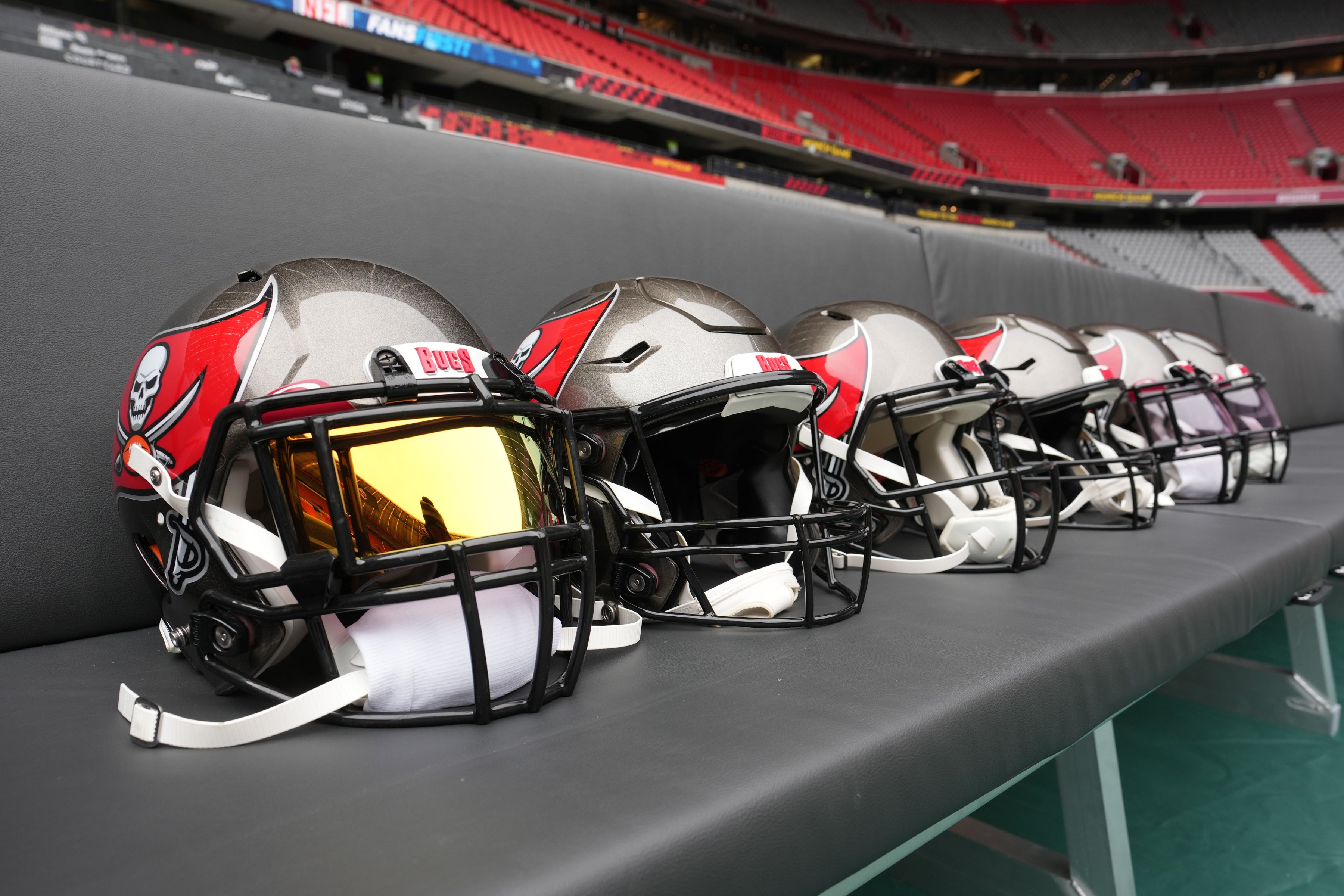Nov 13, 2022; Munich, Germany; Tampa Bay Buccaneers helmets on the bench before an NFL International Series game at Allianz Arena. Mandatory Credit: Kirby Lee-USA TODAY Sports