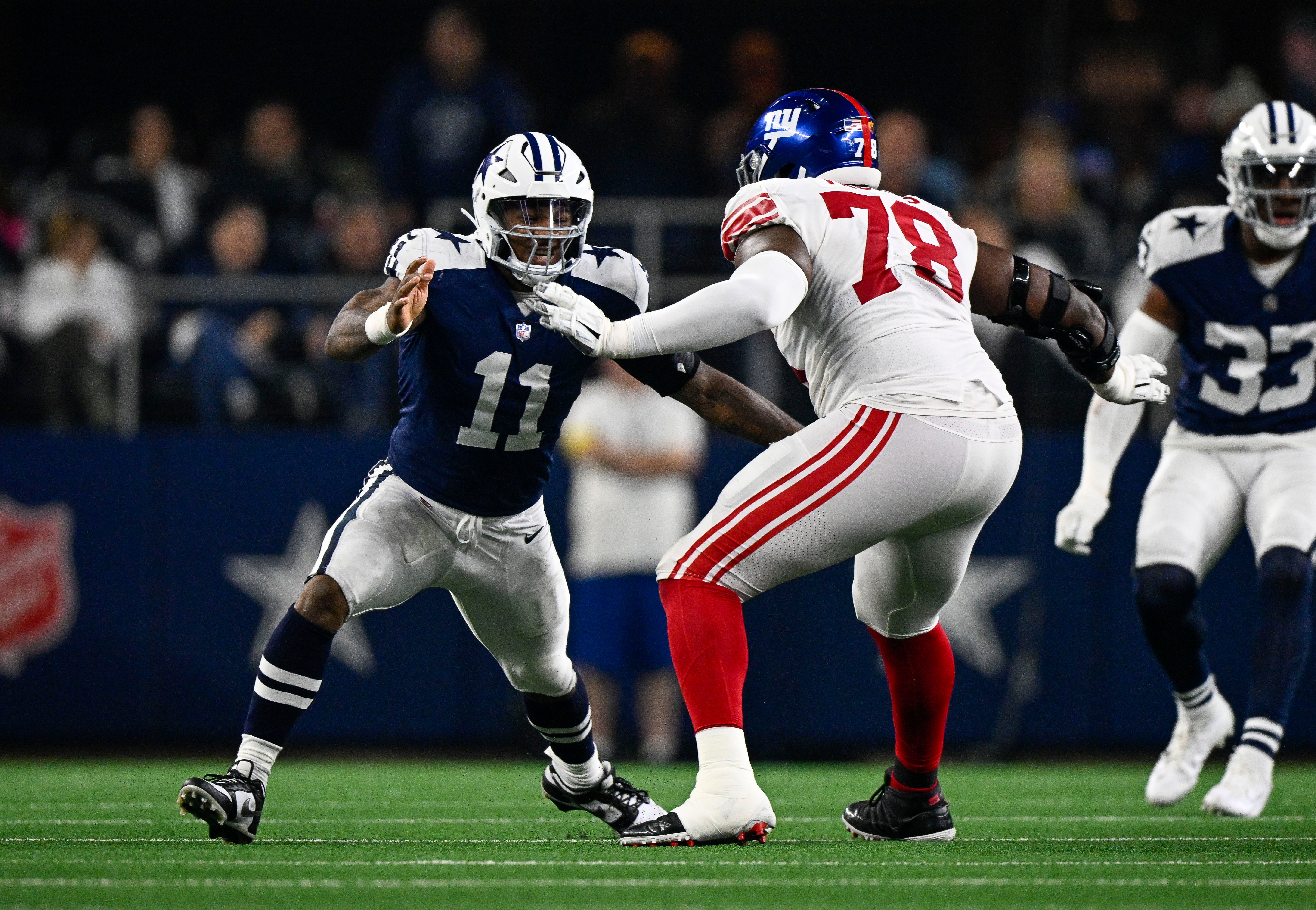 Dallas Cowboys linebacker Micah Parsons (11) and New York Giants offensive tackle Andrew Thomas (78) in action during the game between the Dallas Cowboys and the New York Giants at AT&T Stadium. Mandatory Credit: Jerome Miron-USA TODAY Sports