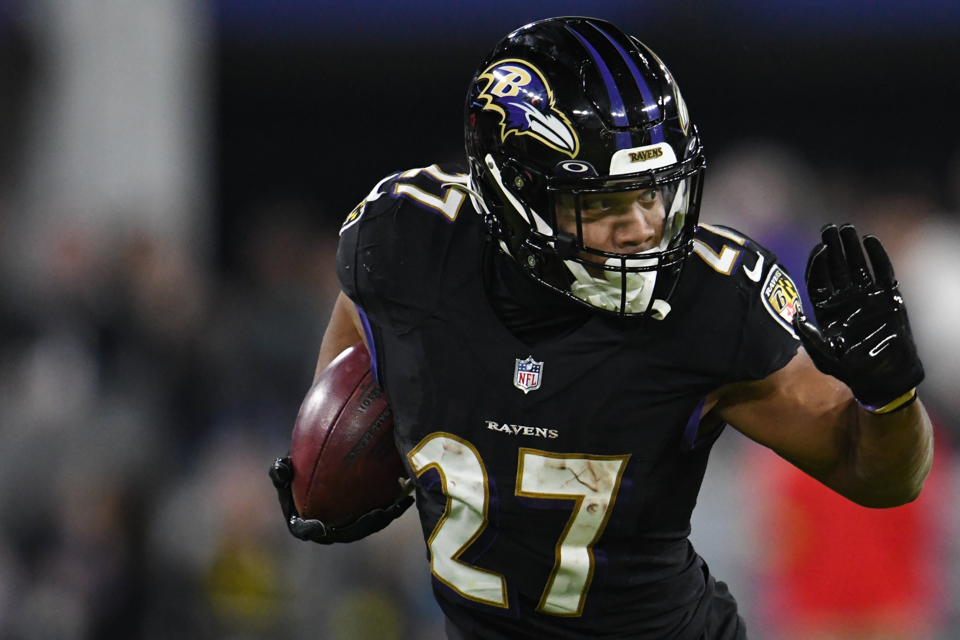 Jan 1, 2023; Baltimore, Maryland, USA; Baltimore Ravens running back J.K. Dobbins (27) rushes during the game against the Pittsburgh Steelers at M&T Bank Stadium. Mandatory Credit: Tommy Gilligan-USA TODAY Sports