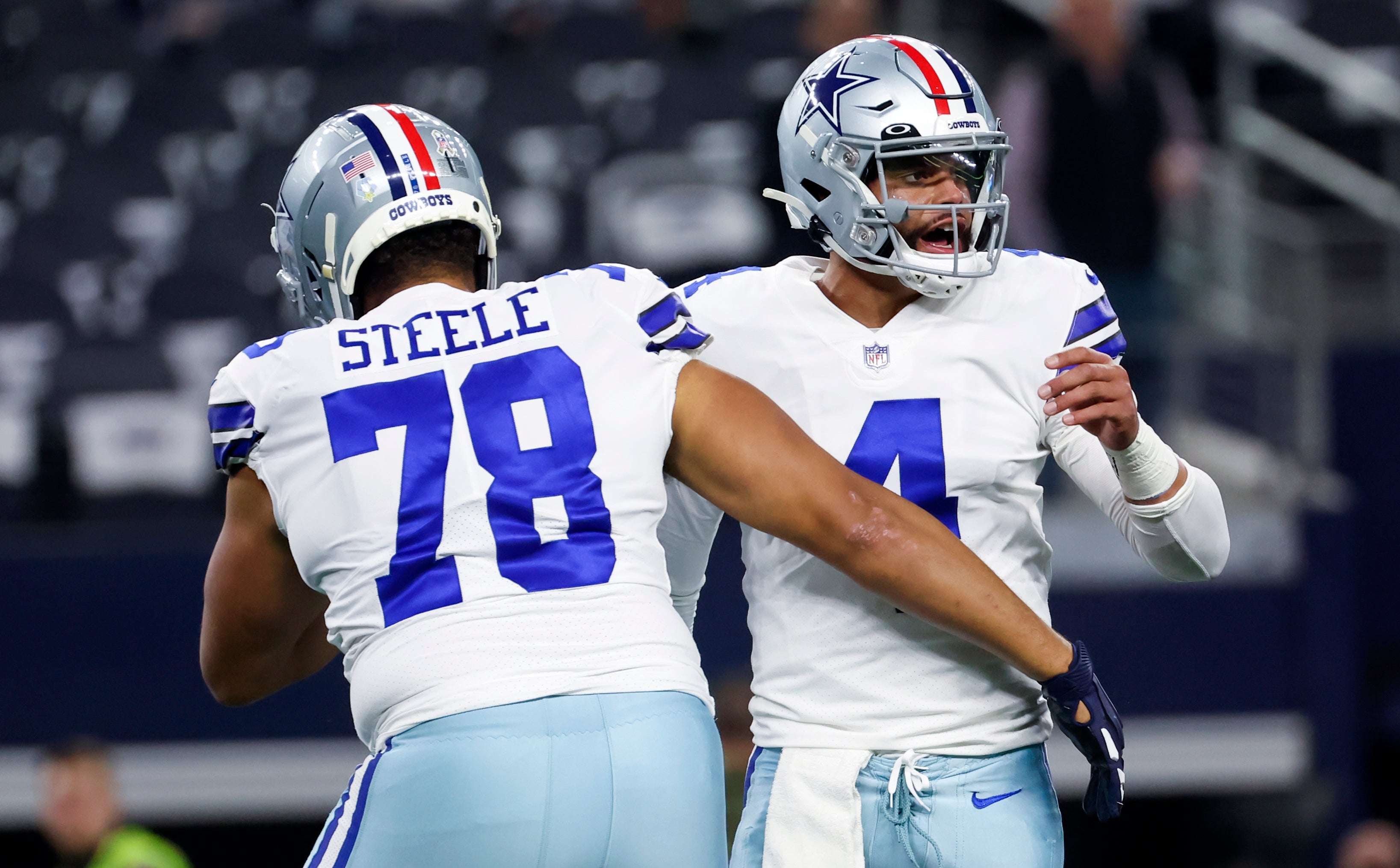Dallas Cowboys quarterback Dak Prescott (4) greets Dallas Cowboys offensive tackle Terence Steele (78) before the game against the Indianapolis Colts at AT&T Stadium. Mandatory Credit: Kevin Jairaj-USA TODAY Sports