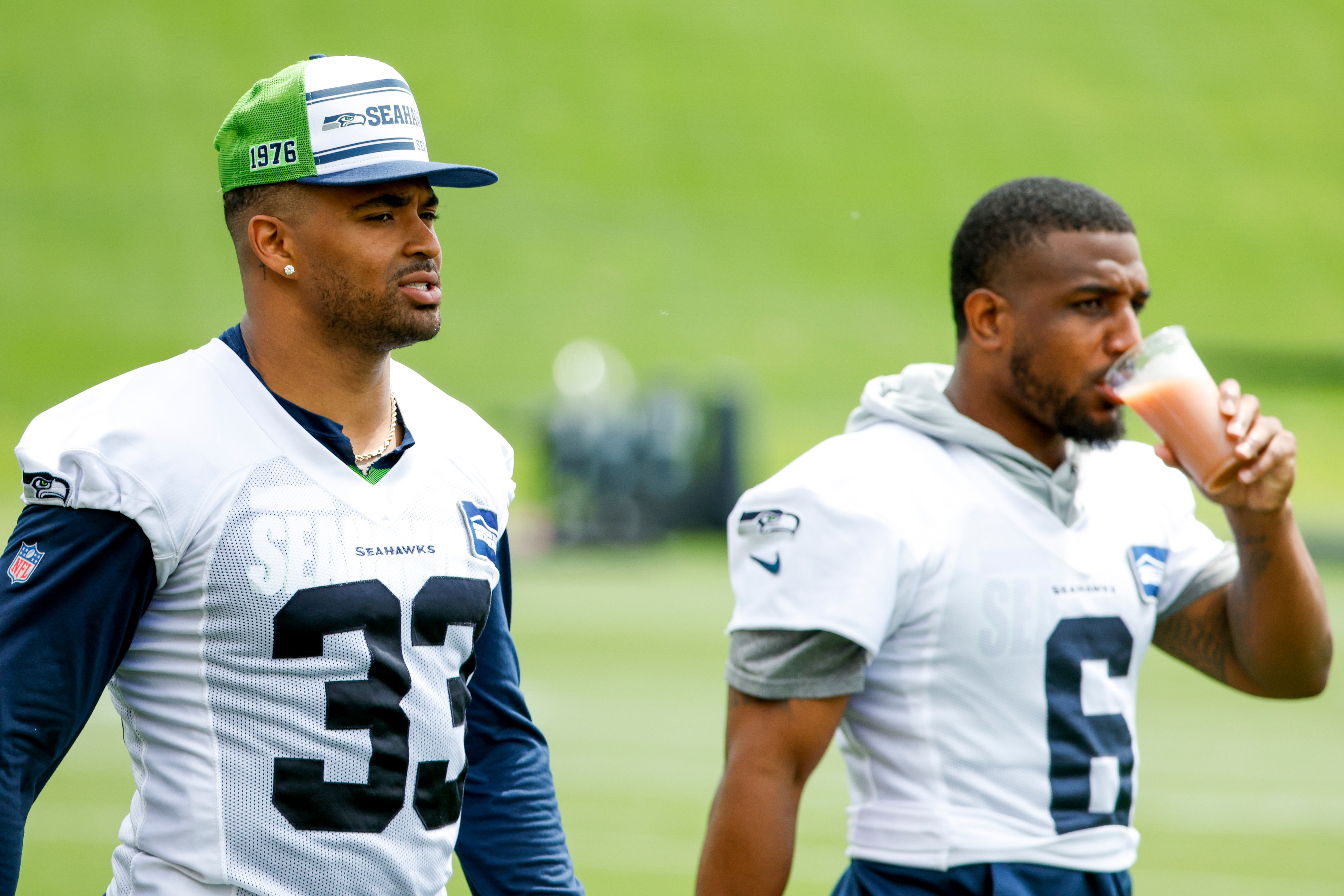 Jun 7, 2022; Renton, Washington, USA; Seattle Seahawks strong safety Jamal Adams (33) and free safety Quandre Diggs (6) walk on the field during minicamp practice at the Virginia Mason Athletic Center Field. Mandatory Credit: Joe Nicholson-USA TODAY Sports