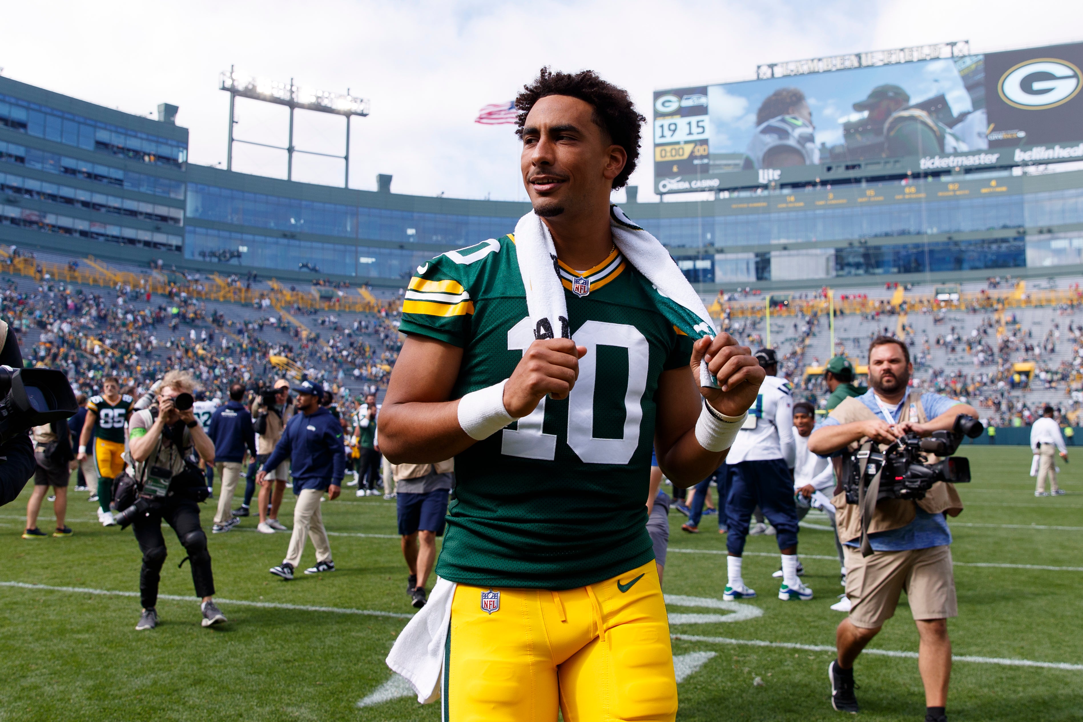 Aug 26, 2023; Green Bay, Wisconsin, USA; Green Bay Packers quarterback Jordan Love (10) walks off the field following the game against the Seattle Seahawks at Lambeau Field. Jeff Hanisch-USA TODAY Sports