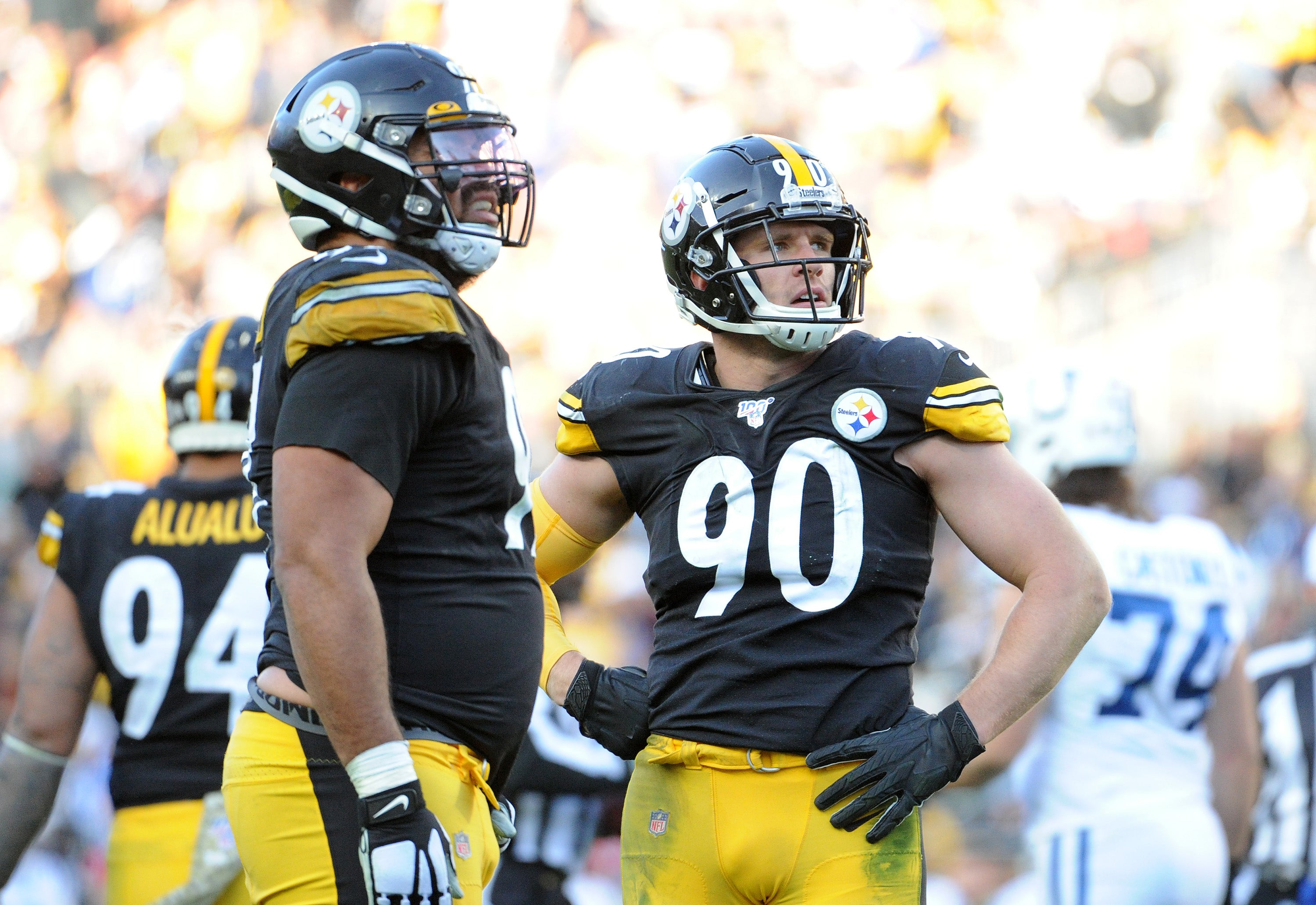 Nov 3, 2019; Pittsburgh, PA, USA; Pittsburgh Steelers linebacker T.J. Watt (90) and defensive end Cameron Heyward (97) watch a replay against the Indianapolis Colts during the fourth quarter at Heinz Field. The Steelers won 26-24. Mandatory Credit: Philip G. Pavely-USA TODAY Sports  