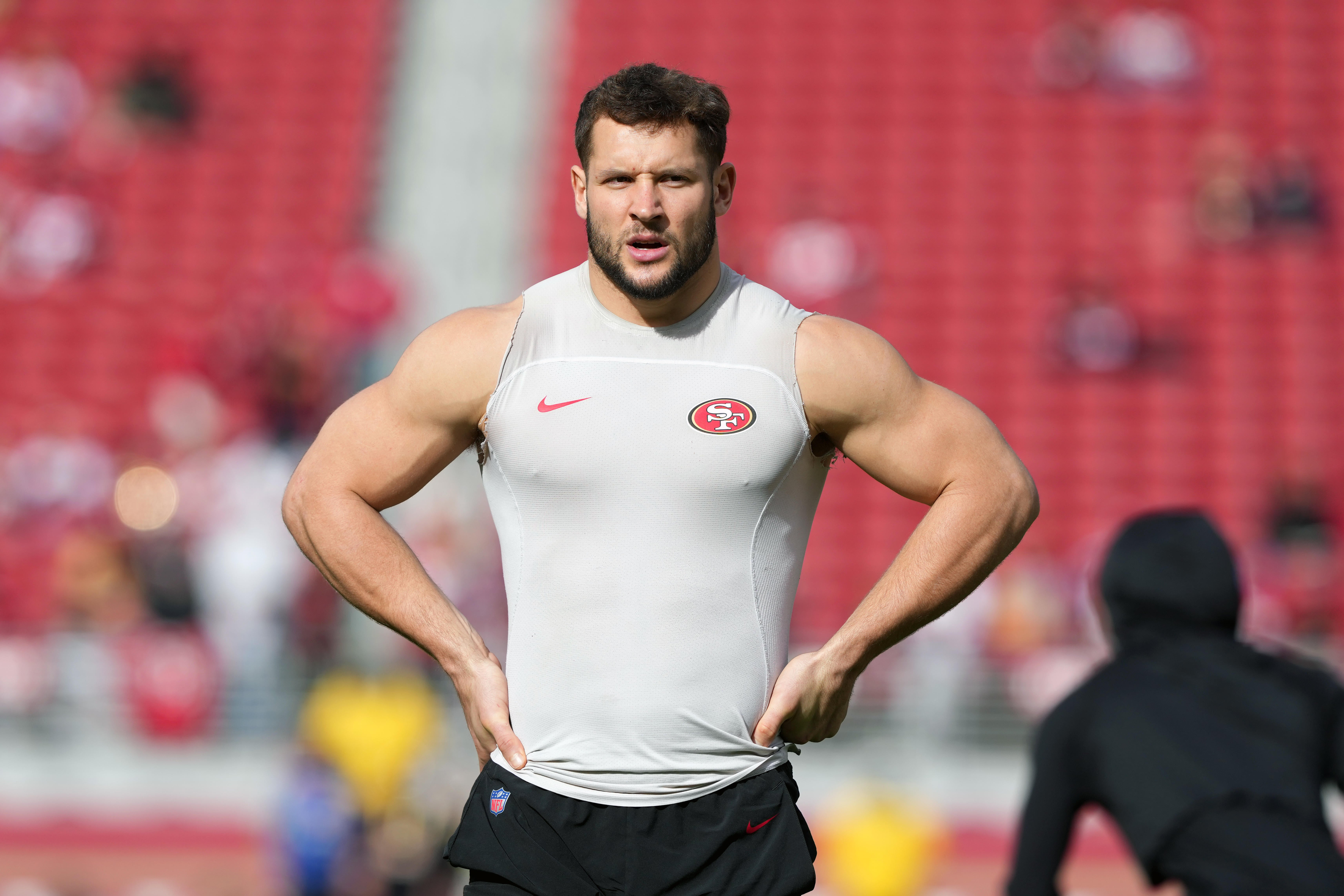Jan 8, 2023; Santa Clara, California, USA; San Francisco 49ers defensive end Nick Bosa (97) warms up before the game against the Arizona Cardinals at Levi's Stadium. Mandatory Credit: Darren Yamashita-USA TODAY Sports