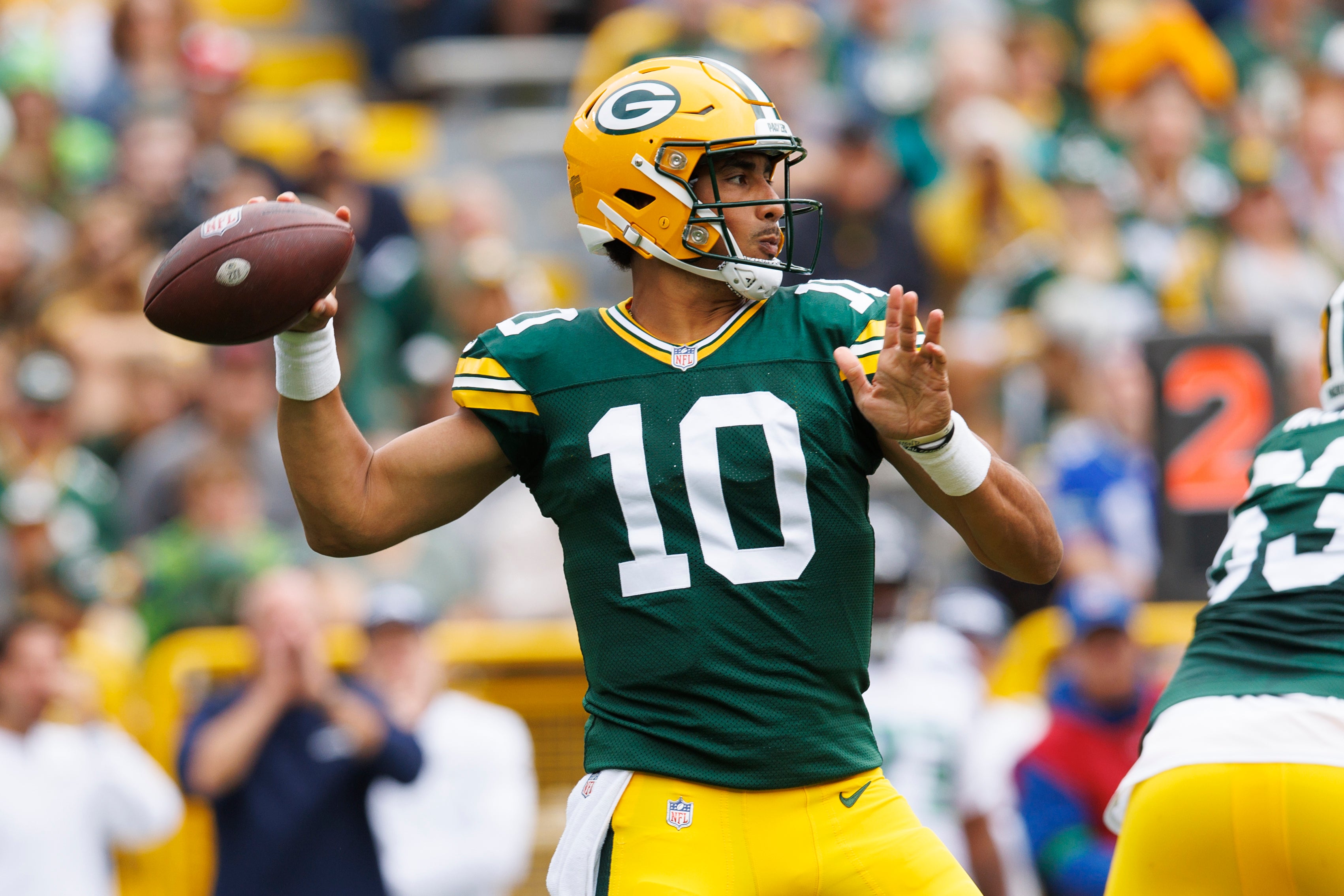 Aug 26, 2023; Green Bay, Wisconsin, USA; Green Bay Packers quarterback Jordan Love (10) throws a pass during the first quarter against the Seattle Seahawks at Lambeau Field. Jeff Hanisch-USA TODAY Sports