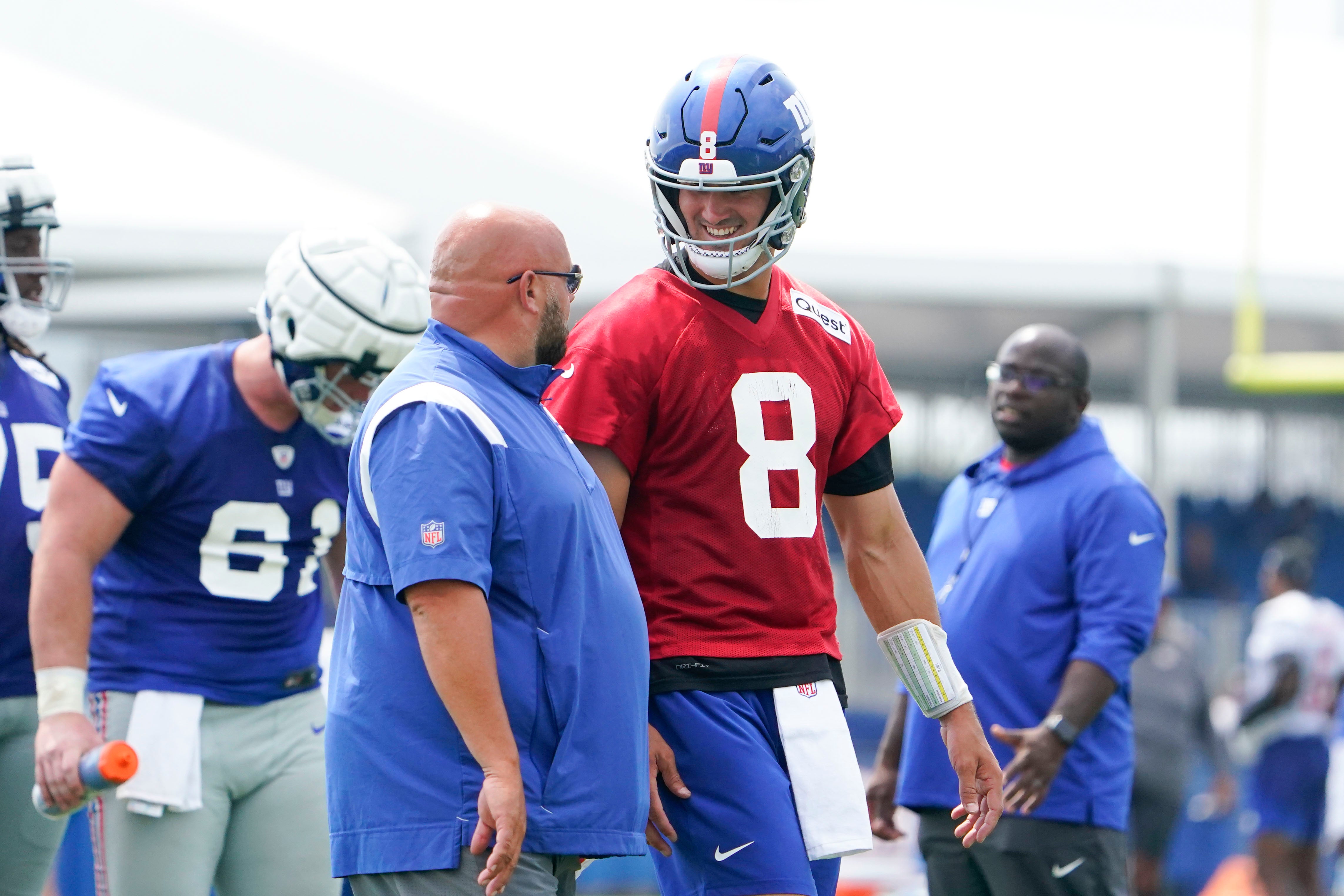 Jul 27, 2023; East Rutherford, NJ, USA; New York Giants quarterback Daniel Jones (8) and head coach Brian Daboll talk on day two of training camp at the Quest Diagnostics Training Facility. Mandatory Credit: Danielle Parhizkaran-USA TODAY Sports