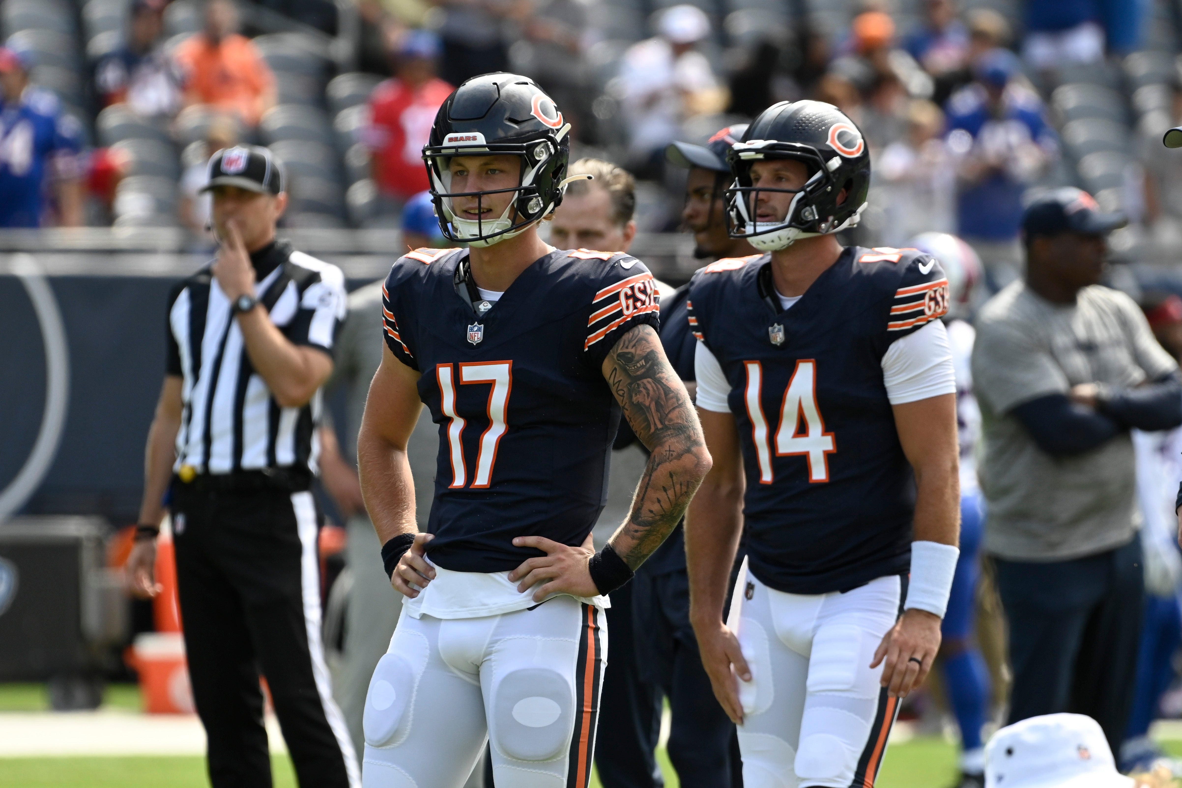 Aug 26, 2023; Chicago, Illinois, USA; Chicago Bears quarterback Tyson Bagent (17) and Chicago Bears quarterback Nathan Peterman (14) during warm ups before the game against the Buffalo Bills at Soldier Field. Mandatory Credit: Matt Marton-USA TODAY Sports