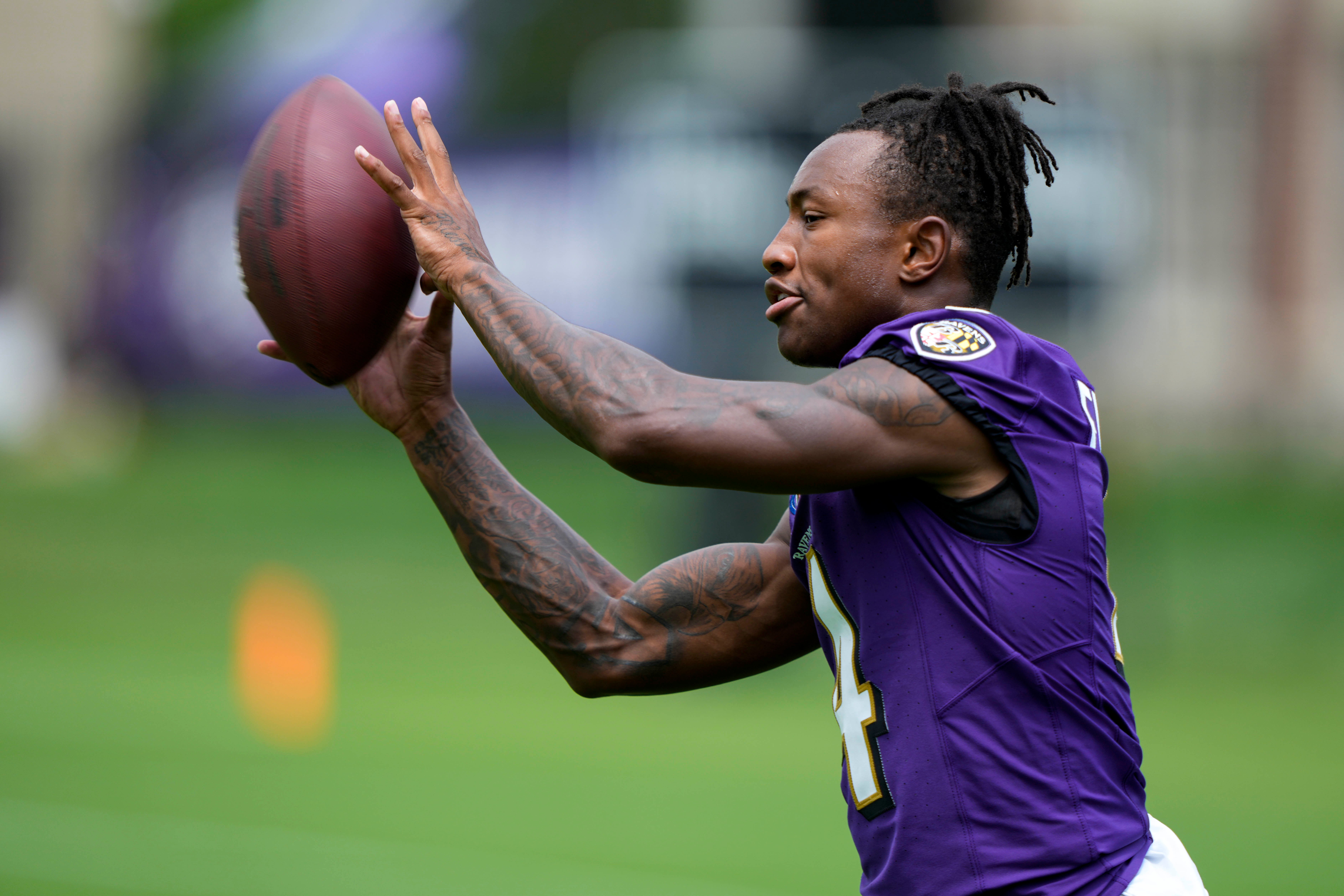 Jul 27, 2023; Owings Mills, MD, USA; Baltimore Ravens wide receiver Zay Flowers (4) catches a pass during training camp practice at Under Armour Performance Center. Mandatory Credit: Brent Skeen-USA TODAY Sports