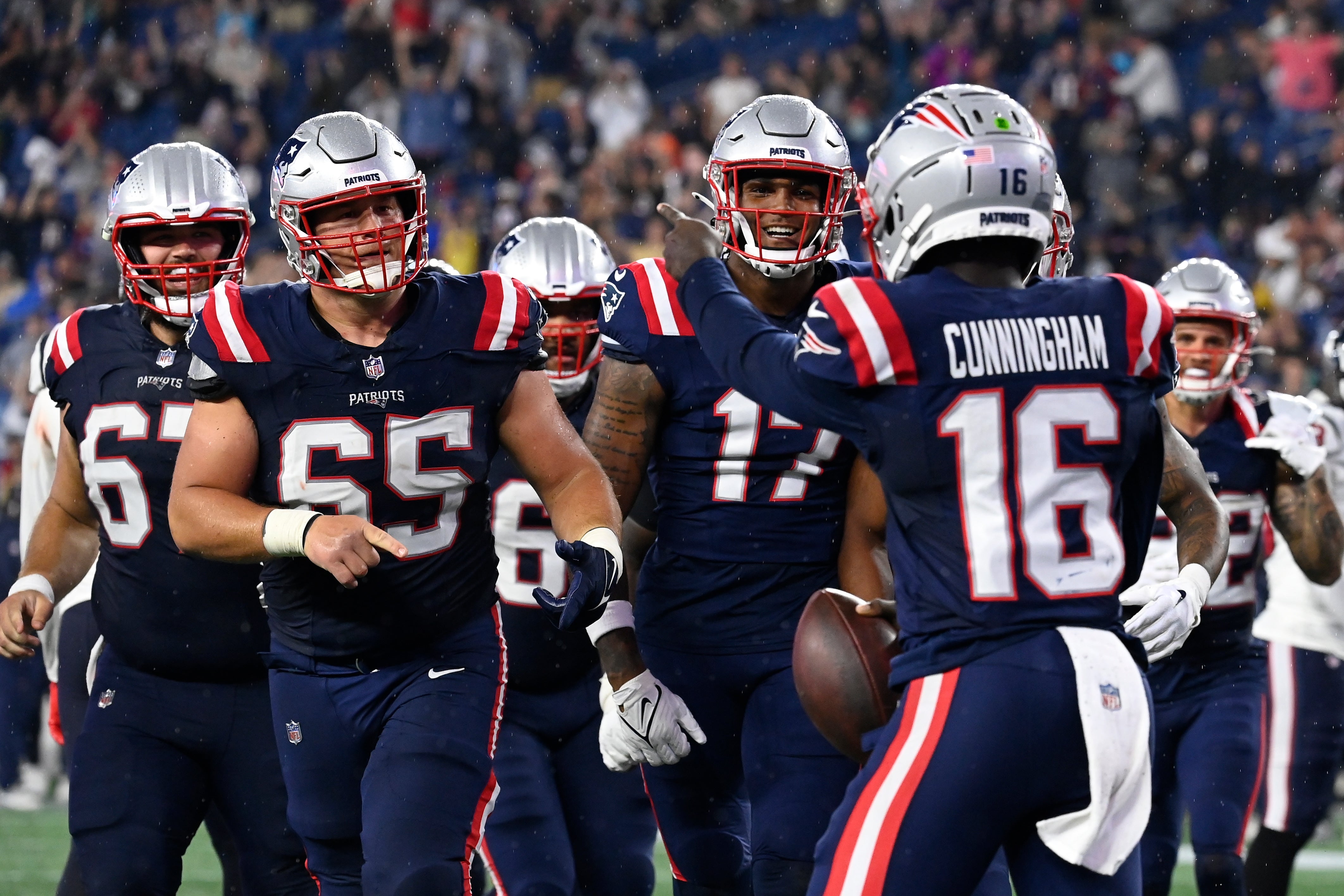 Aug 10, 2023; Foxborough, Massachusetts, USA; New England Patriots quarterback Malik Cunningham (16) celebrates his touchdown with teammates center Jake Andrews (67) guard James Ferentz (65), tight end Scotty Washington (17) (L to R) during the second half against the Houston Texans at Gillette Stadium.