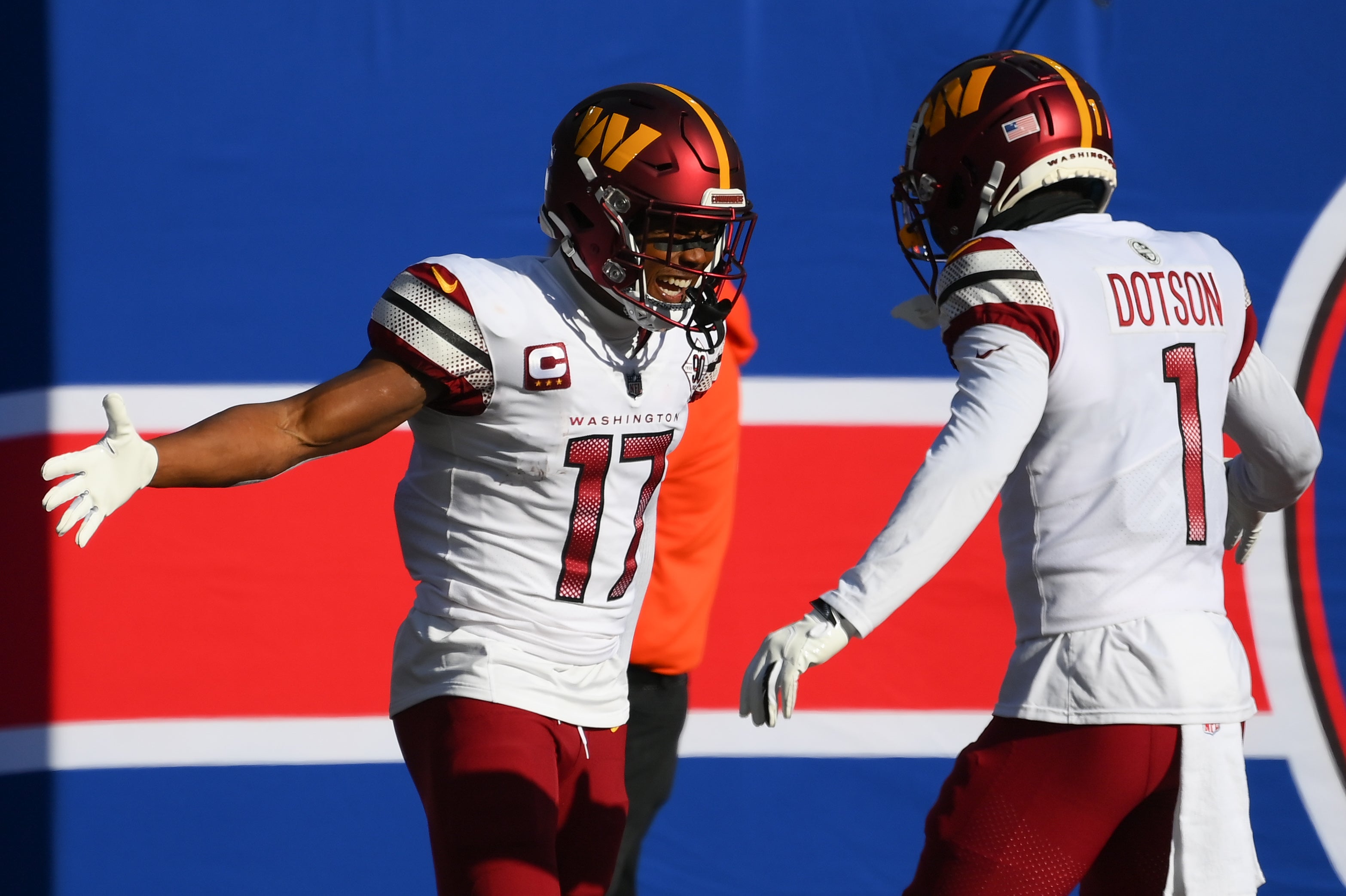Dec 4, 2022; East Rutherford, New Jersey, USA; Washington Commanders wide receiver Terry McLaurin (17) celebrates his touchdown with wide receiver Jahan Dotson (1) against the New York Giants during the first half at MetLife Stadium. Rich Barnes-USA TODAY Sports