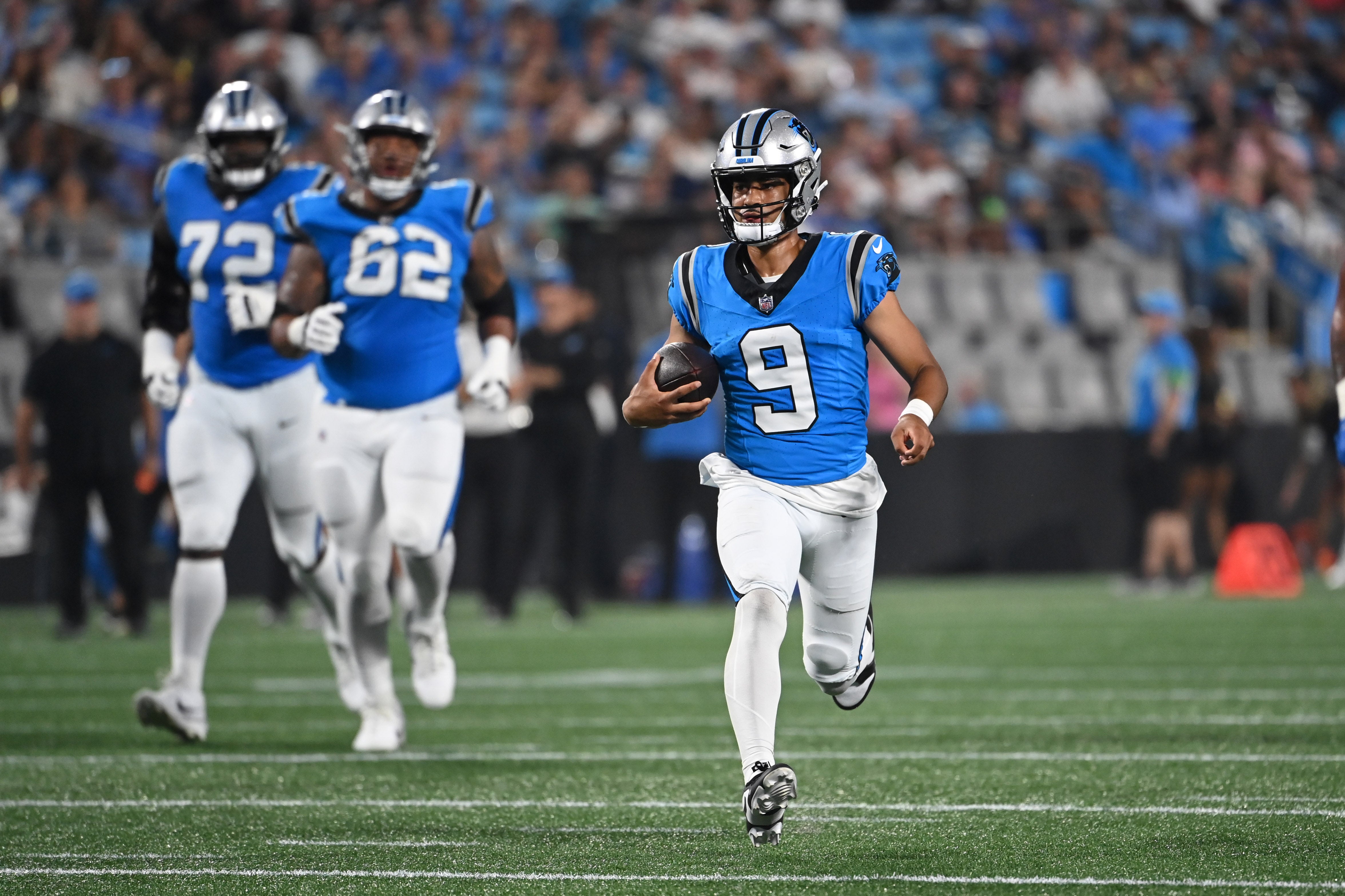 Aug 25, 2023; Charlotte, North Carolina, USA; Carolina Panthers quarterback Bryce Young (9) runs in the first quarter at Bank of America Stadium. Mandatory Credit: Bob Donnan-USA TODAY Sports
