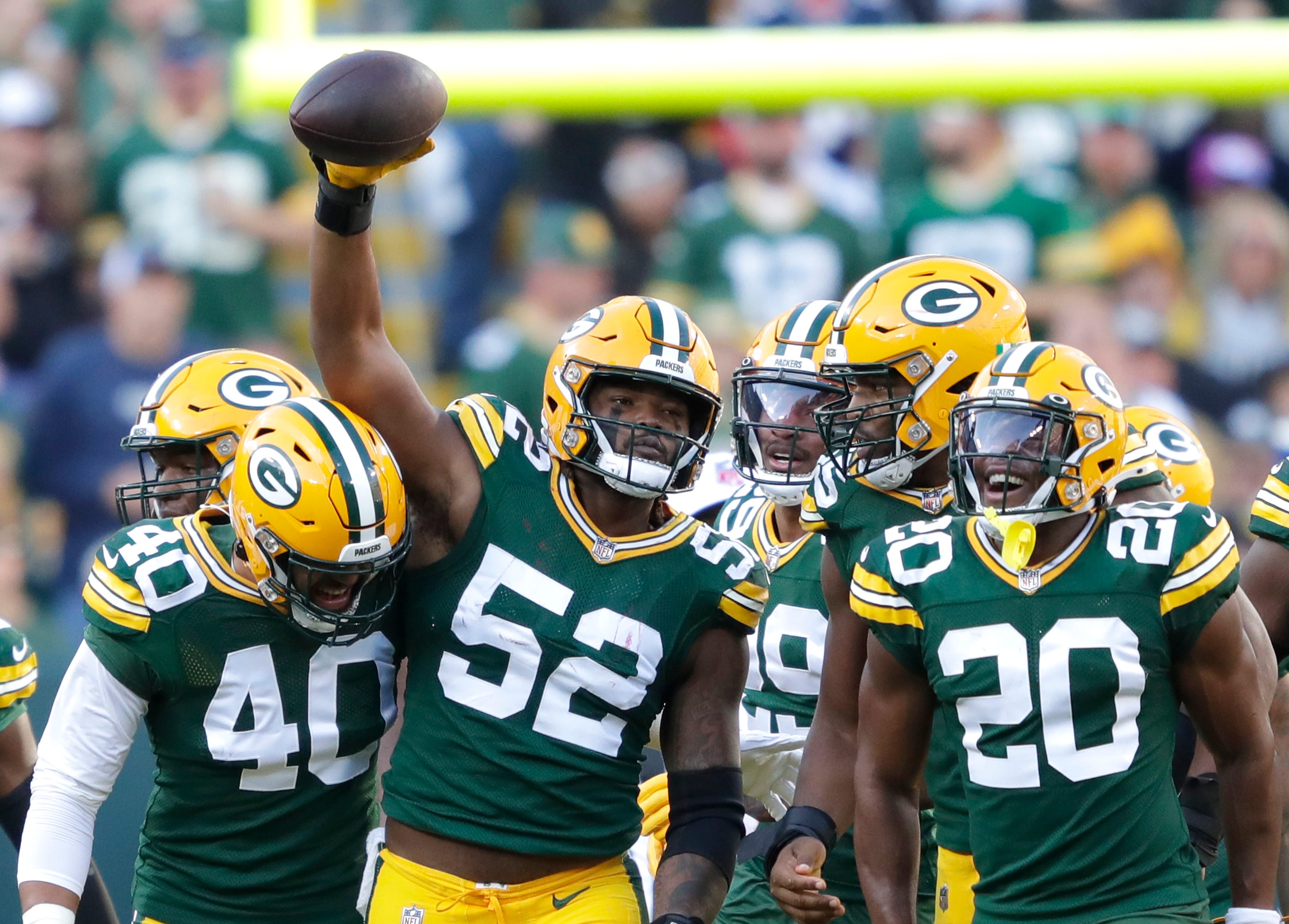 Green Bay Packers linebacker Rashan Gary (52) celebrates with teammates after sacking New England Patriots quarterback Bailey Zappe during their football game Sunday, October 2, at Lambeau Field in Green Bay, Wis. Dan Powers/USA TODAY NETWORK-Wisconsin
