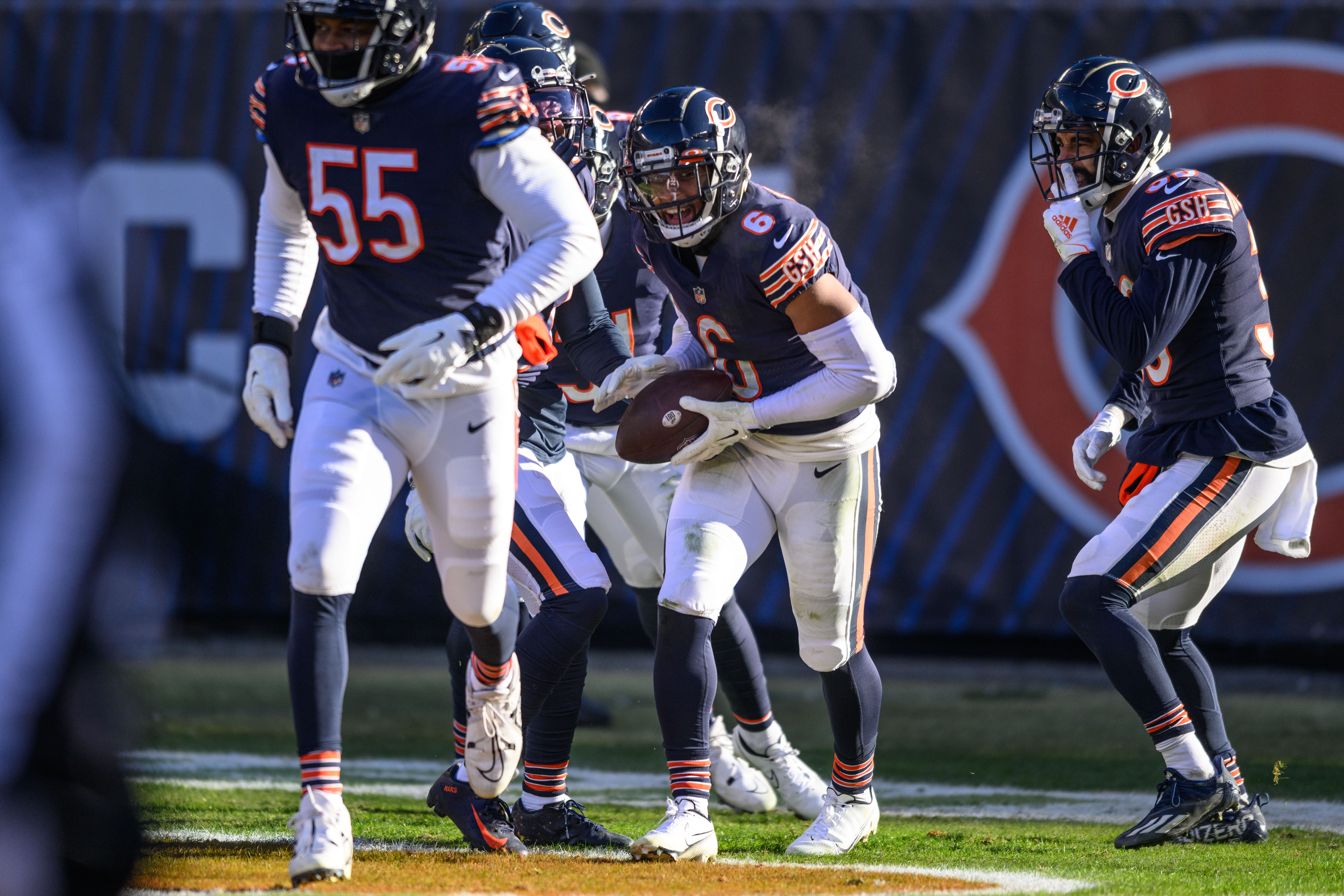 Dec 18, 2022; Chicago, Illinois, USA; Chicago Bears cornerback Kyler Gordon (6) celebrates his fumble recovery in the first quarter against the Philadelphia Eagles at Soldier Field. Mandatory Credit: Daniel Bartel-USA TODAY Sports