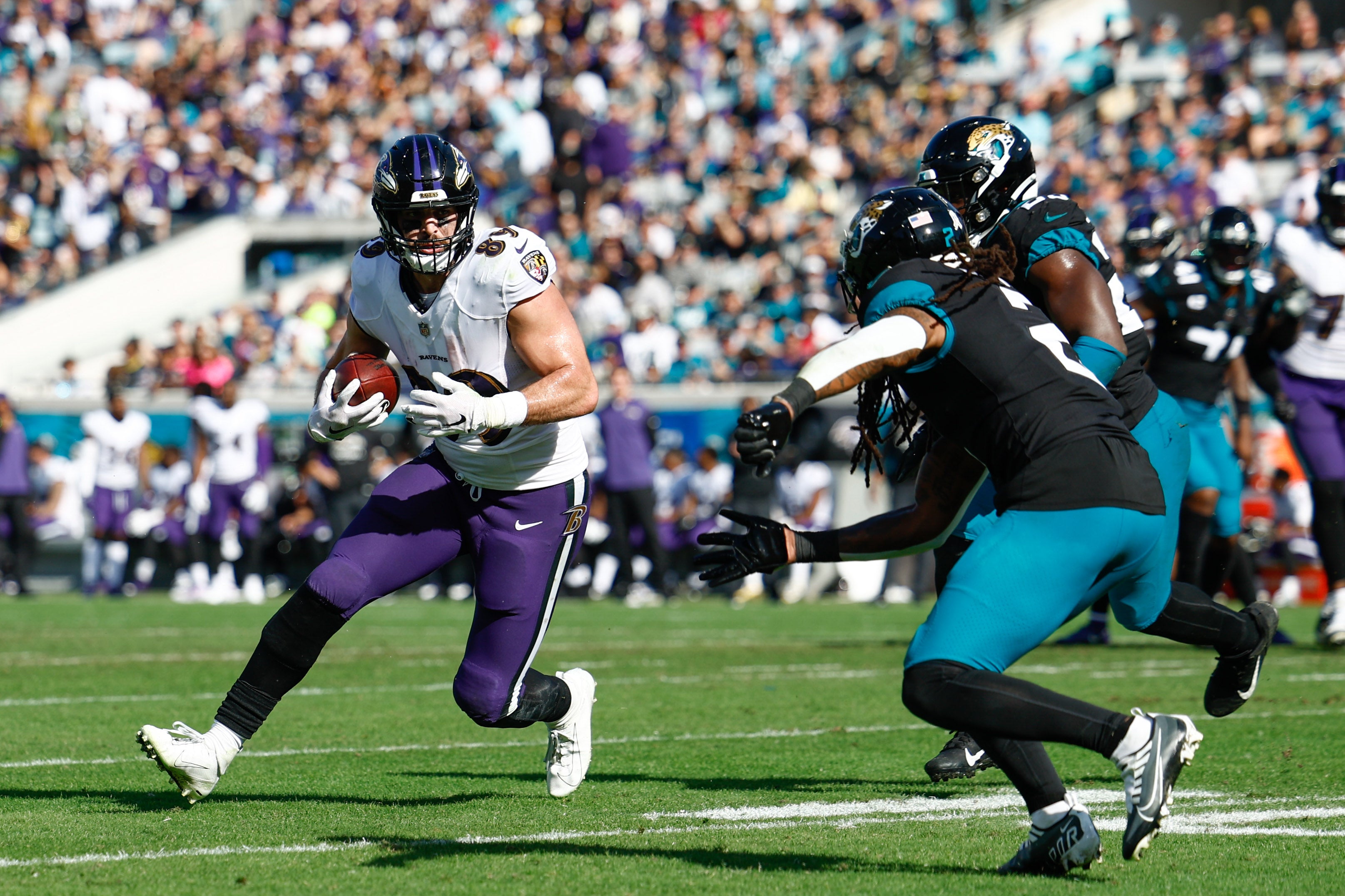 Nov 27, 2022; Jacksonville, Florida, USA; Baltimore Ravens tight end Mark Andrews (89) runs with the ball against the Jacksonville Jaguars during the first quarter at TIAA Bank Field. Mandatory Credit: Douglas DeFelice-USA TODAY Sports