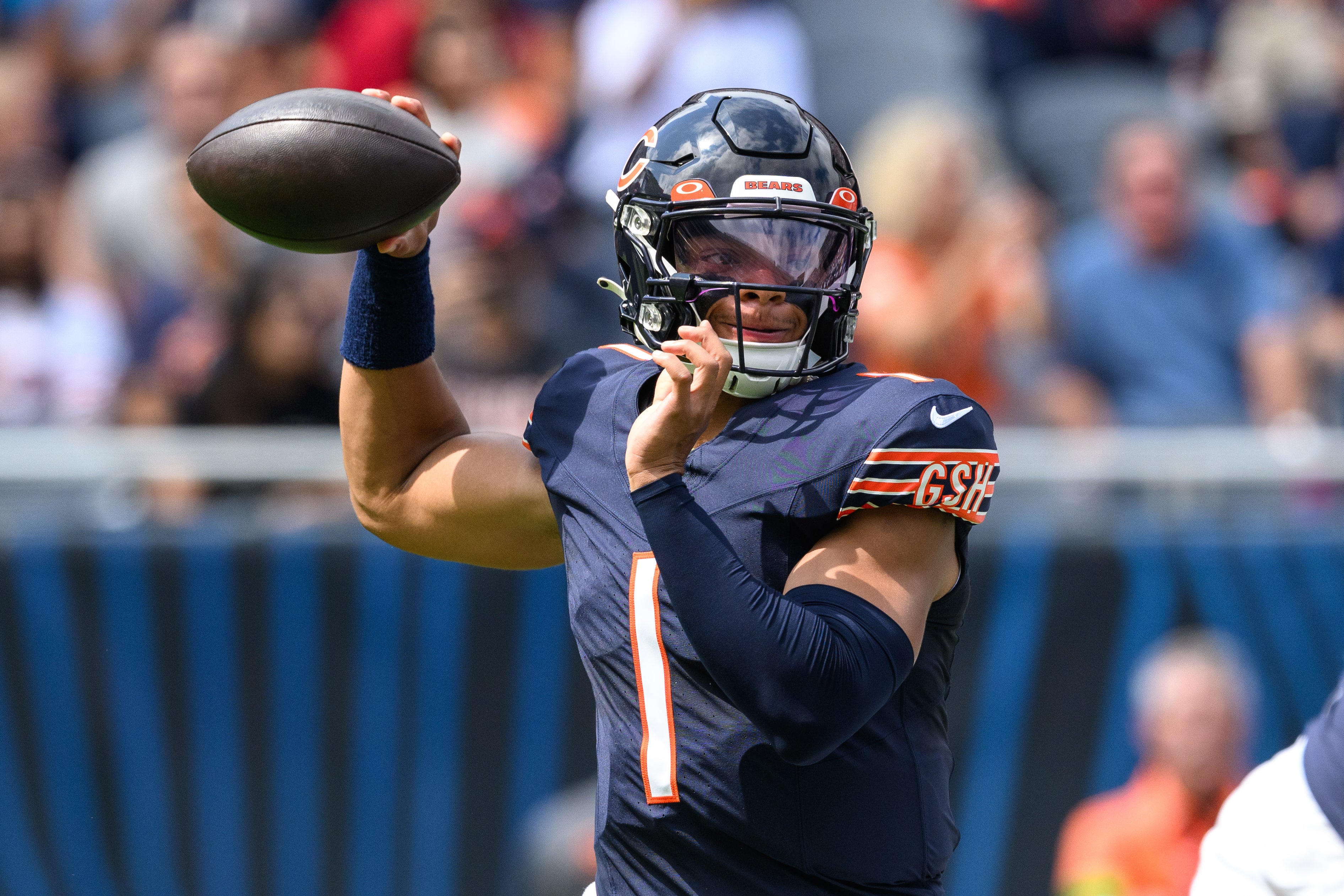 Aug 26, 2023; Chicago, Illinois, USA; Chicago Bears quarterback Justin Fields (1) passes the ball against the Buffalo Bills during the first quarter at Soldier Field. Mandatory Credit: Daniel Bartel-USA TODAY Sports