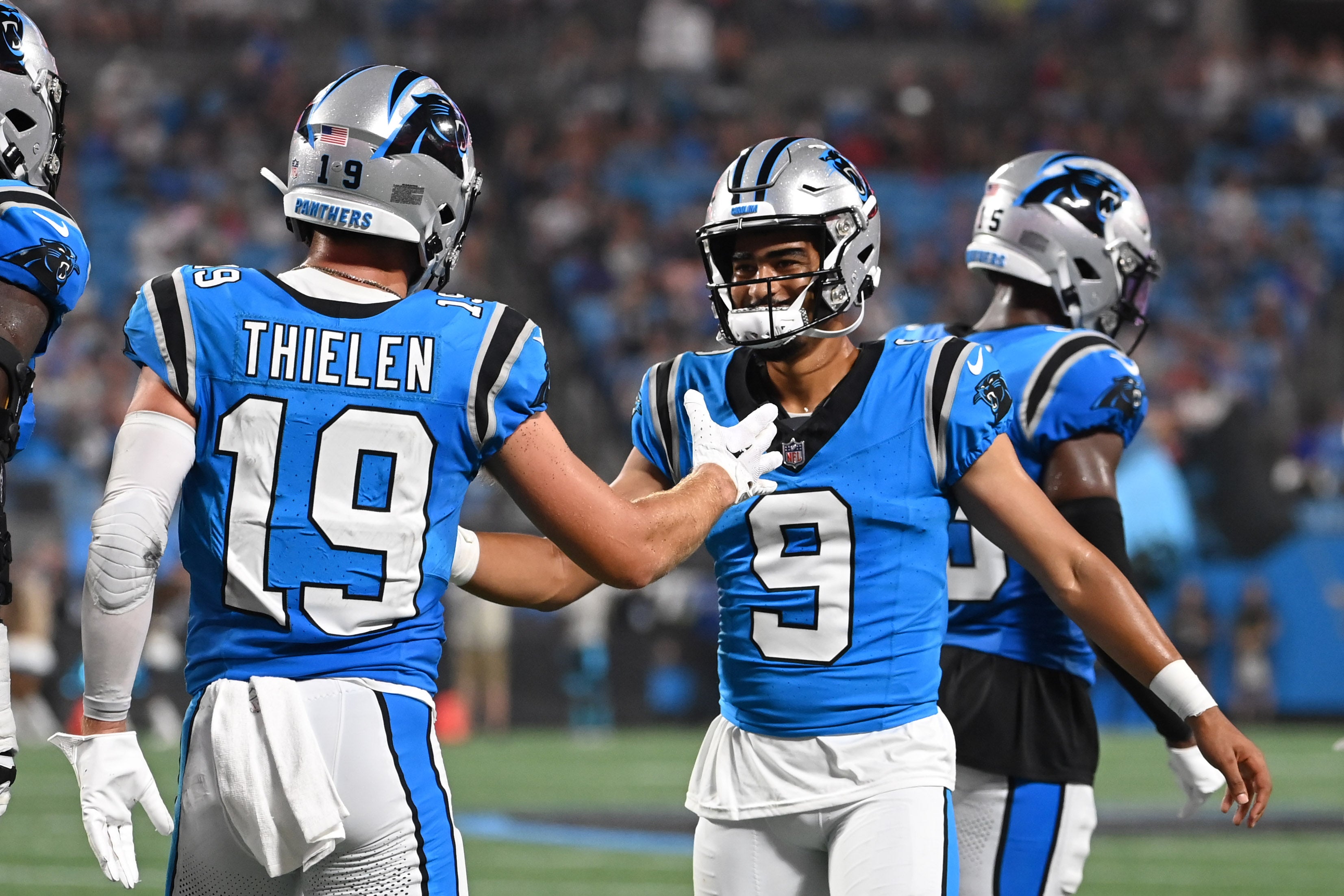 Aug 25, 2023; Charlotte, North Carolina, USA; Carolina Panthers wide receiver Adam Thielen (19) celebrates with quarterback Bryce Young (9) after scoring a touchdown in the first quarter at Bank of America Stadium. Mandatory Credit: Bob Donnan-USA TODAY Sports