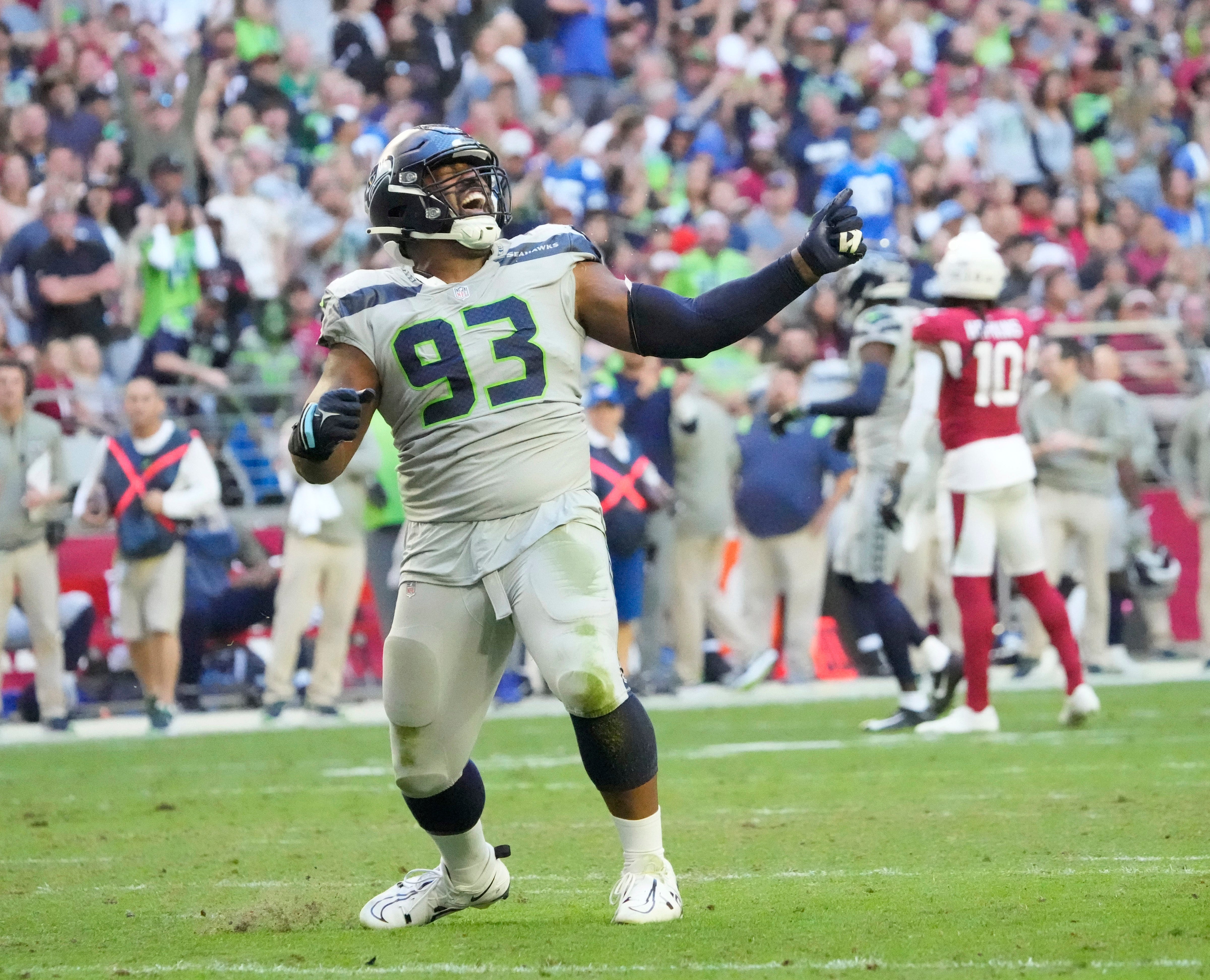 Nov 6, 2022; Phoenix, Ariz., United States; Seattle Seahawks defensive end Shelby Harris (93) celebrates after a sack against the Arizona Cardinals during the fourth quarter at State Farm Stadium. Mandatory Credit: Michael Chow-Arizona Republic