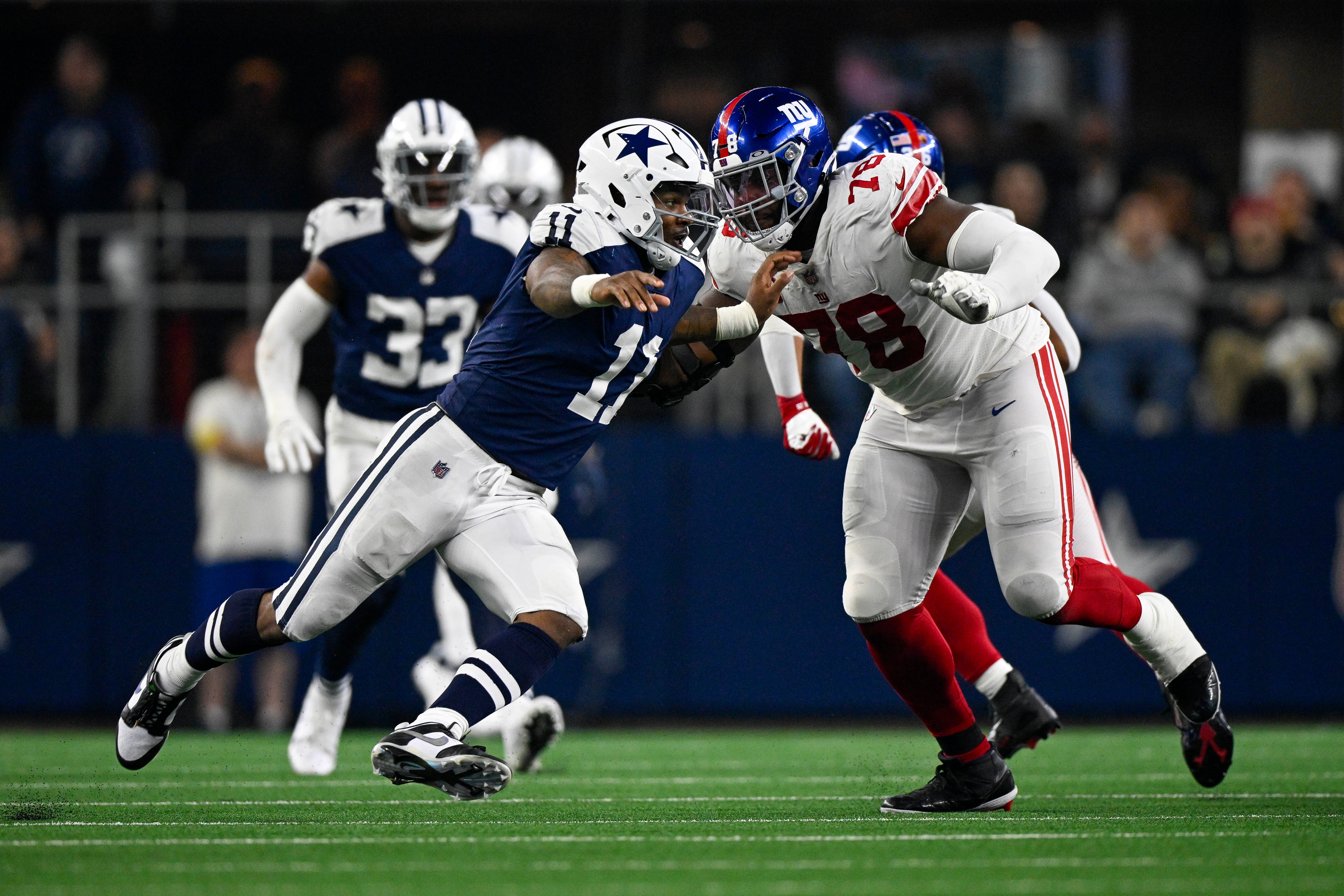 Dallas Cowboys linebacker Micah Parsons (11) and New York Giants offensive tackle Andrew Thomas (78) in action during the game between the Dallas Cowboys and the New York Giants at AT&T Stadium. Mandatory Credit: Jerome Miron-USA TODAY Sports