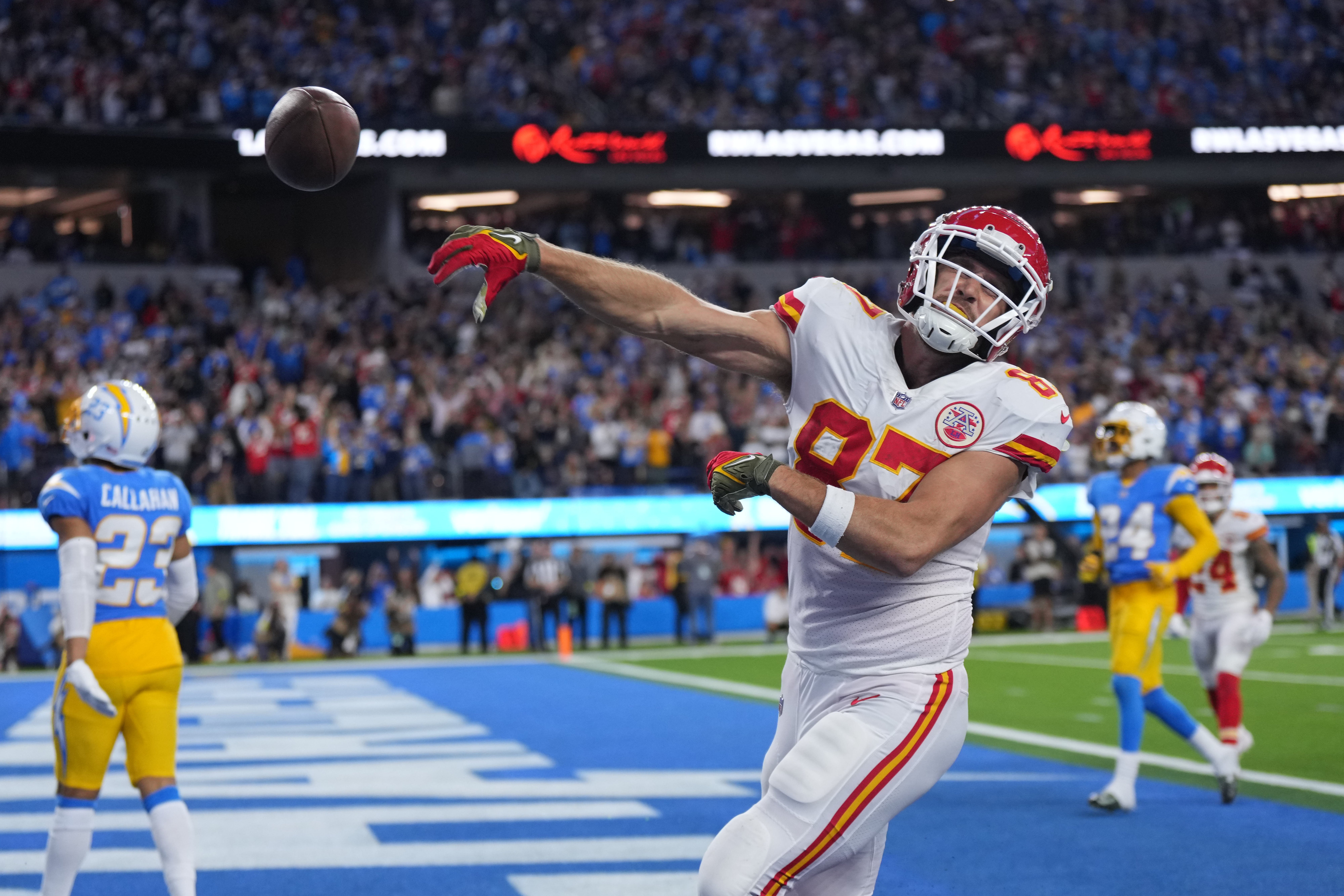 Nov 20, 2022; Inglewood, California, USA; Kansas City Chiefs tight end Travis Kelce (87) celebrates after scoring on a 17-yard touchdown reception with 31 seconds left against the Los Angeles Chargers SoFi Stadium. Kirby Lee-USA TODAY Sports